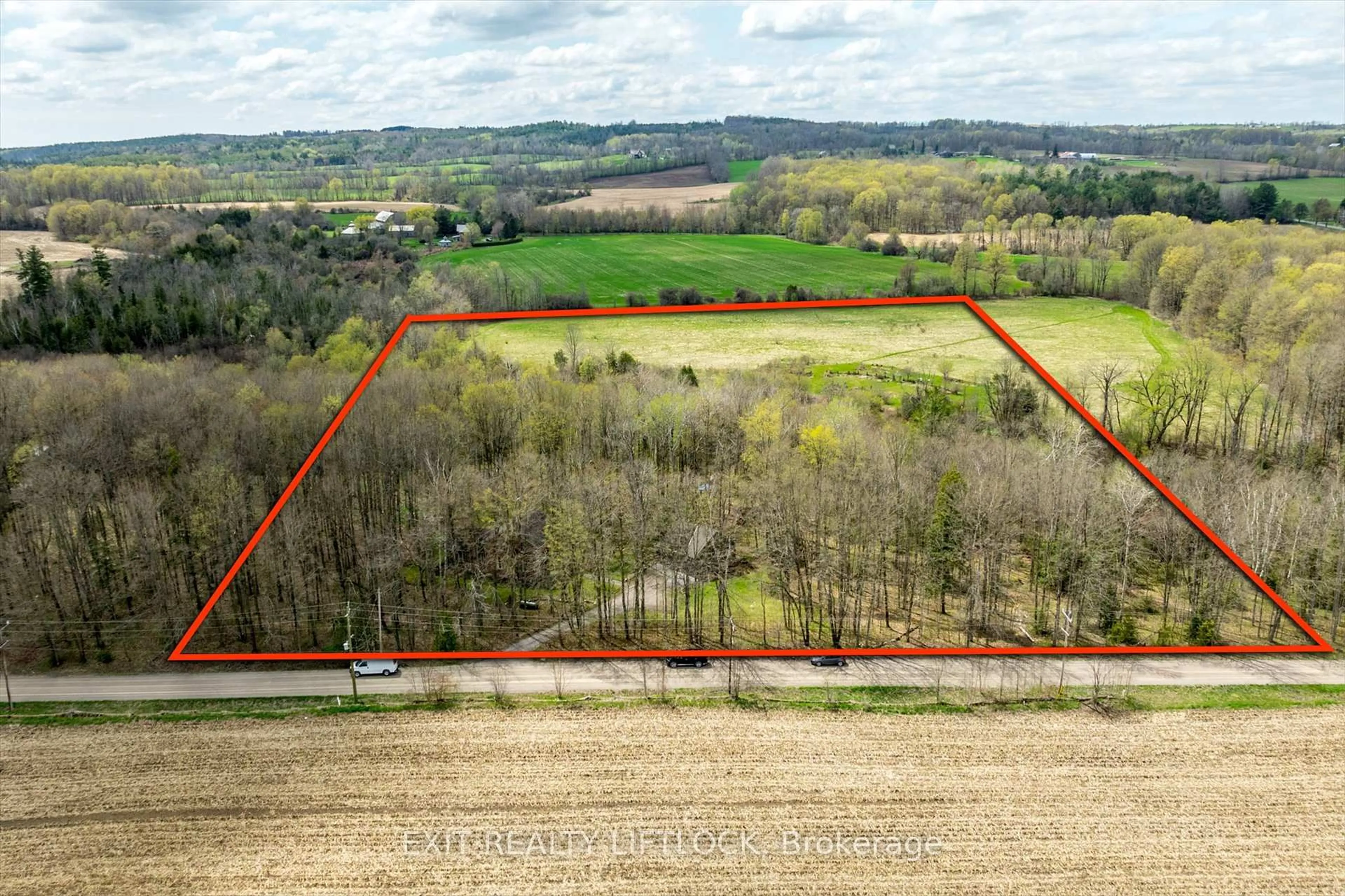 A pic from outside/outdoor area/front of a property/back of a property/a pic from drone, forest/trees view for 136 McCamus 1/4 Line, Cavan Monaghan Ontario L0A 1G0