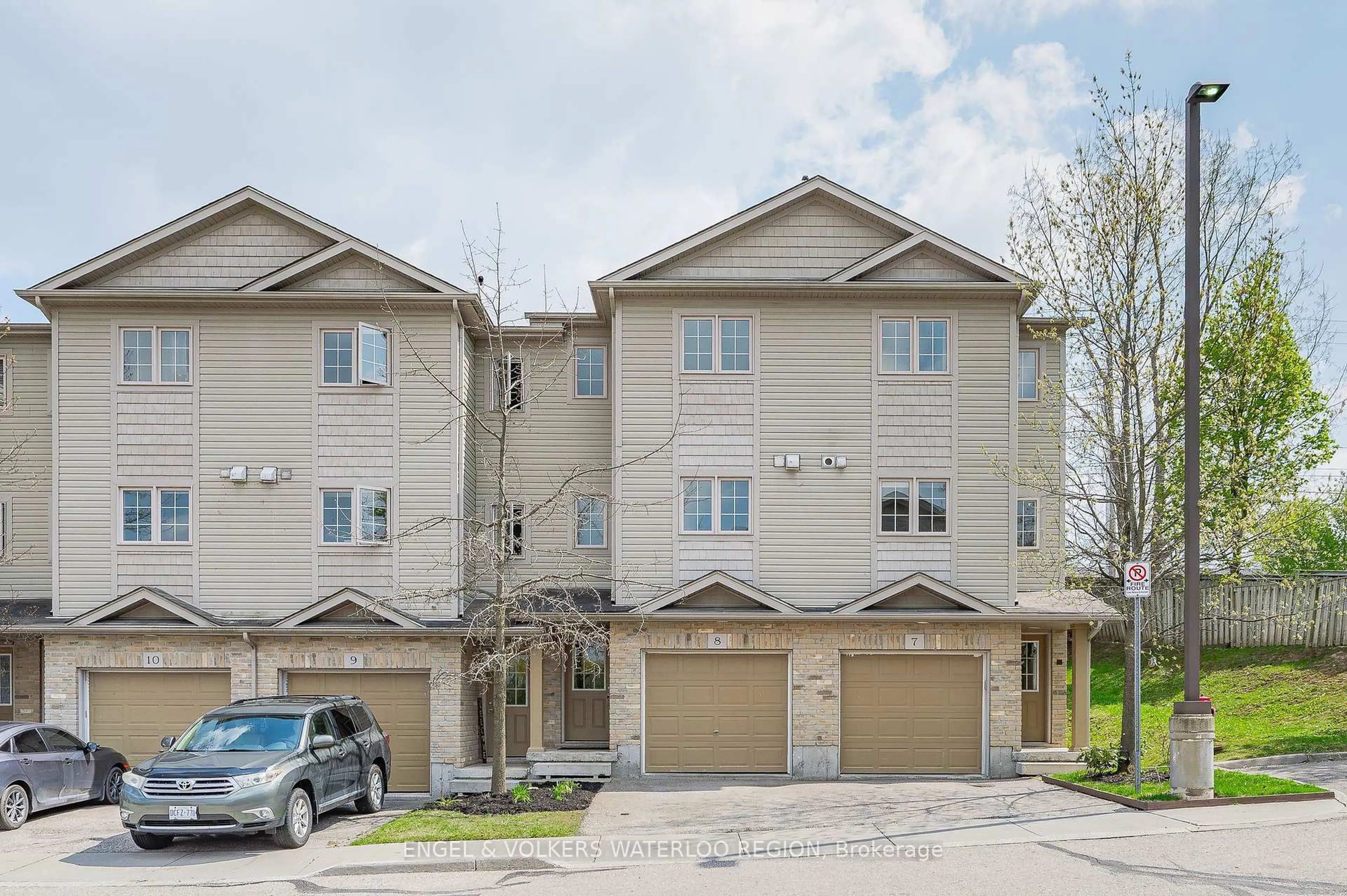 A pic from outside/outdoor area/front of a property/back of a property/a pic from drone, street for 155 Highland Cres #B8, Kitchener Ontario N2M 0A1