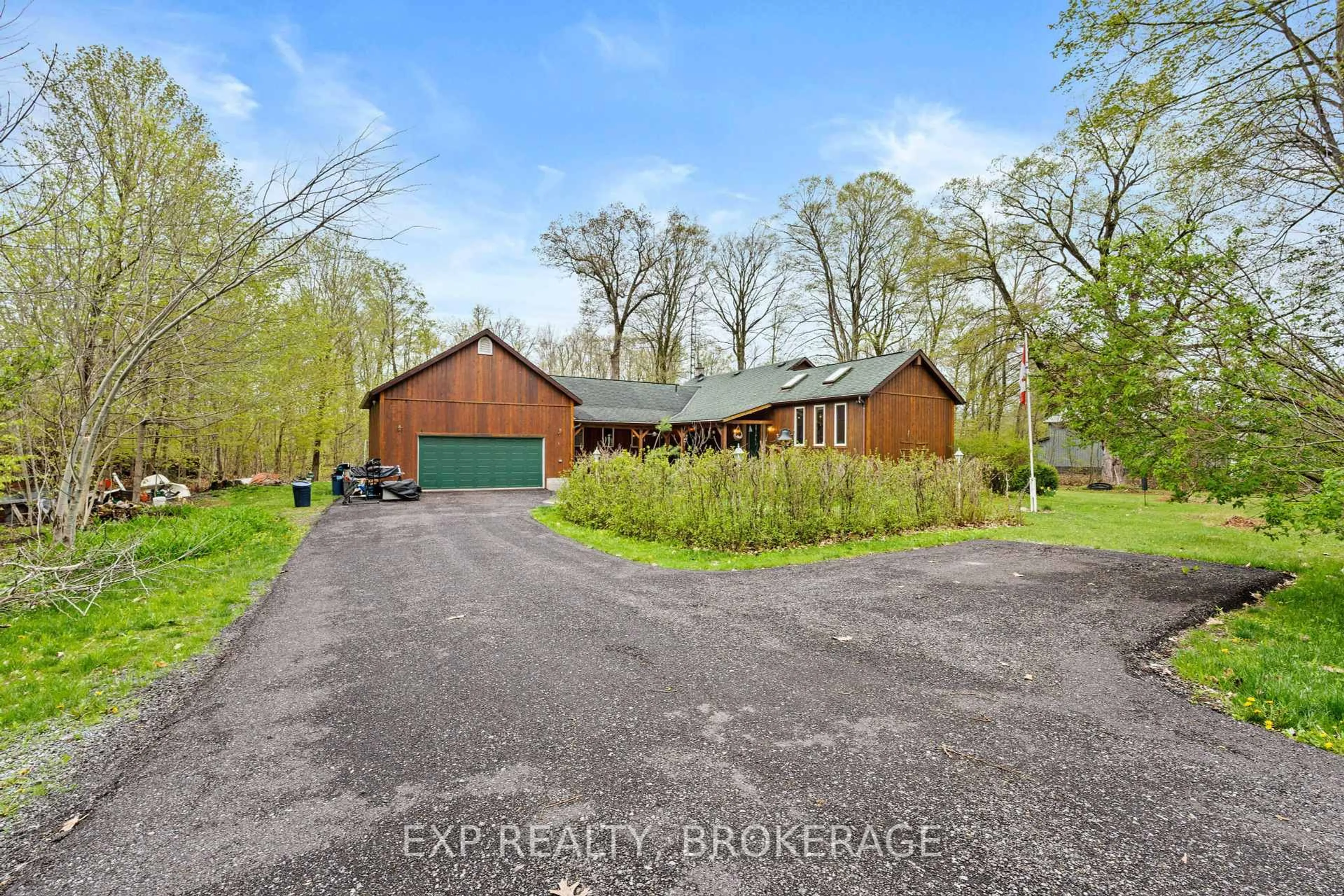 A pic from outside/outdoor area/front of a property/back of a property/a pic from drone, unknown for 5046 CARRYING PLACE Rd, Battersea Ontario K0H 1H0