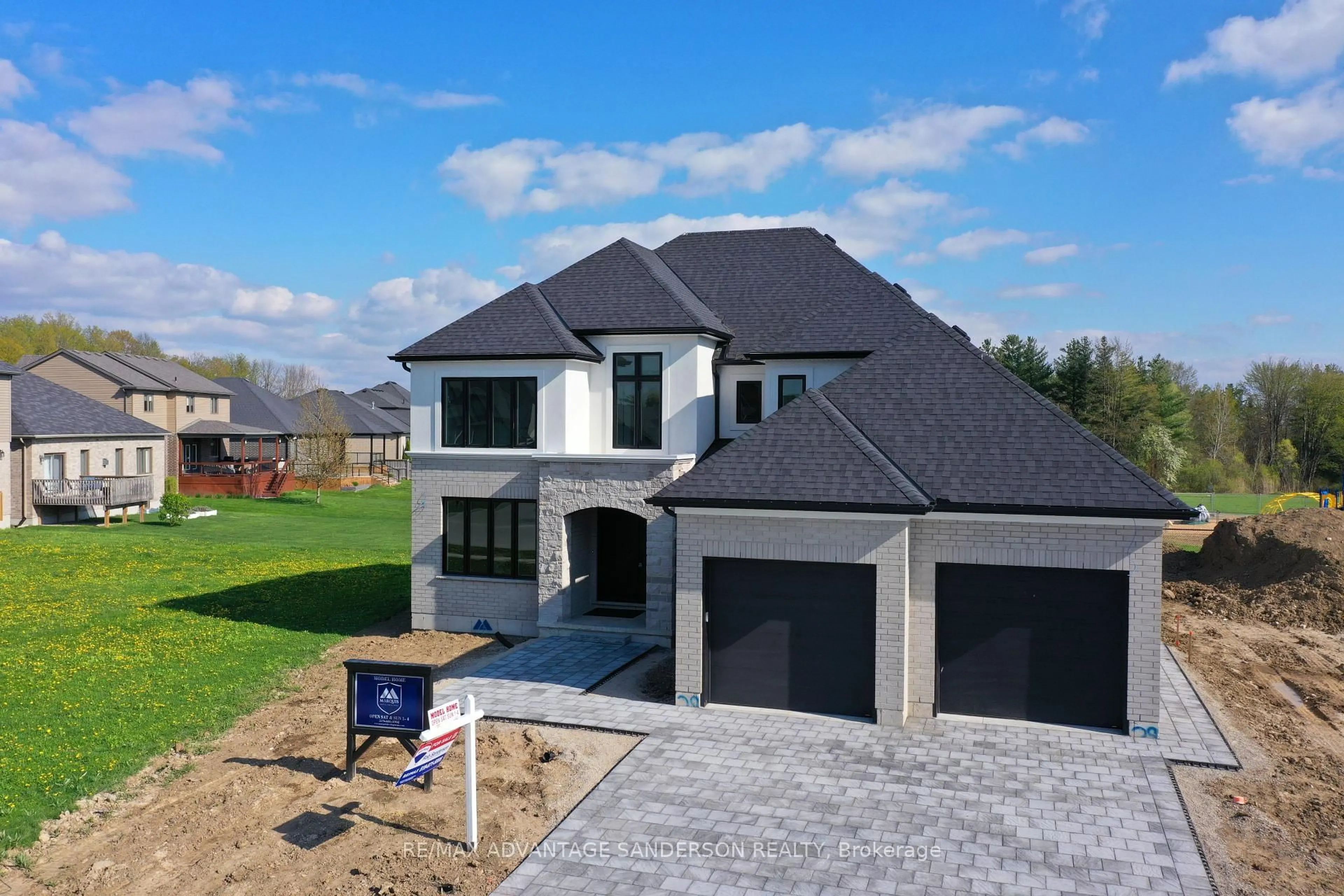 A pic from outside/outdoor area/front of a property/back of a property/a pic from drone, street for 243 Songbird Lane, Middlesex Centre Ontario N0M 2A0