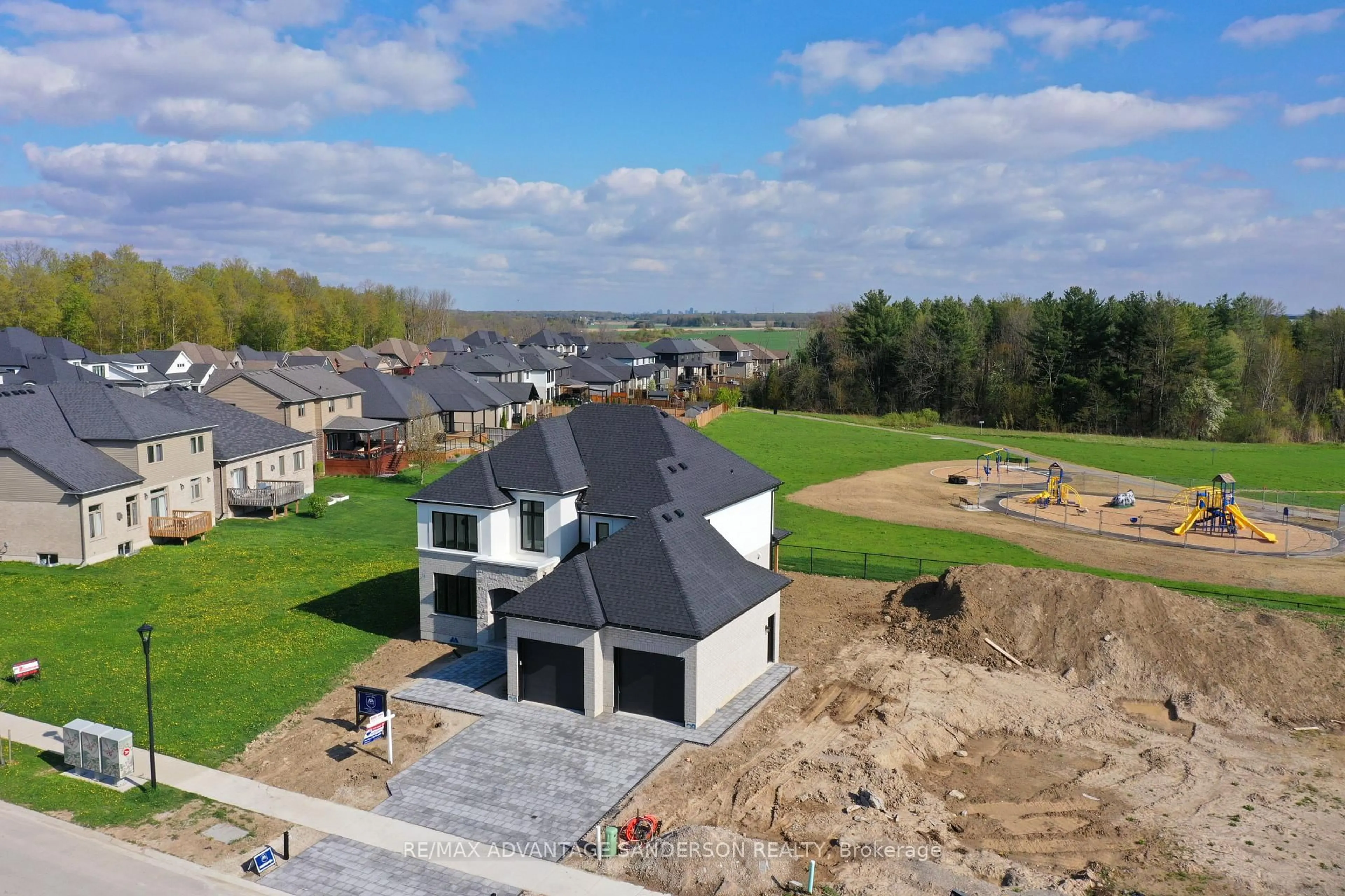 A pic from outside/outdoor area/front of a property/back of a property/a pic from drone, building for 243 Songbird Lane, Middlesex Centre Ontario N0M 2A0