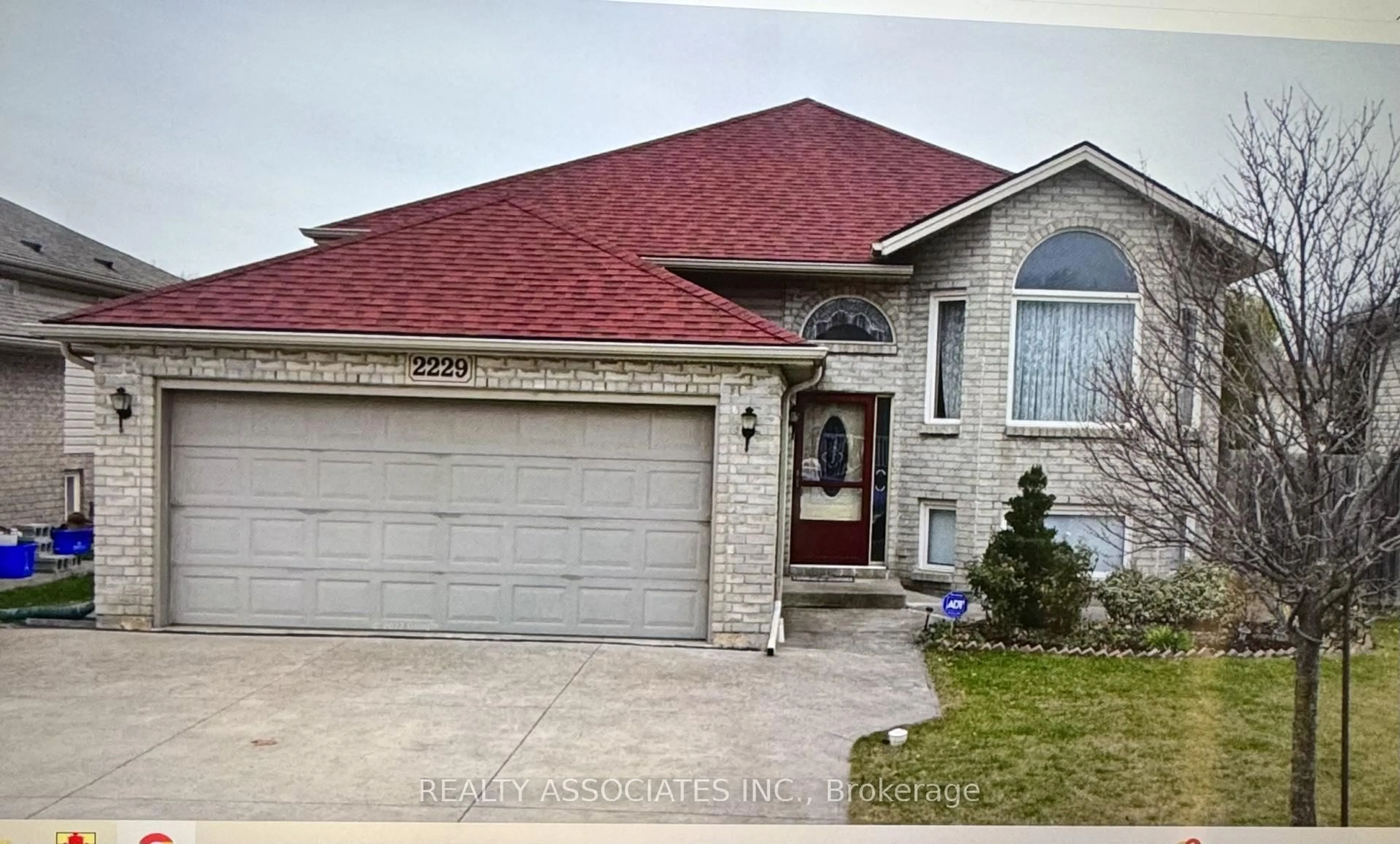 Home with brick exterior material, street for 2229 Curry Ave, Windsor Ontario N9B 3W9