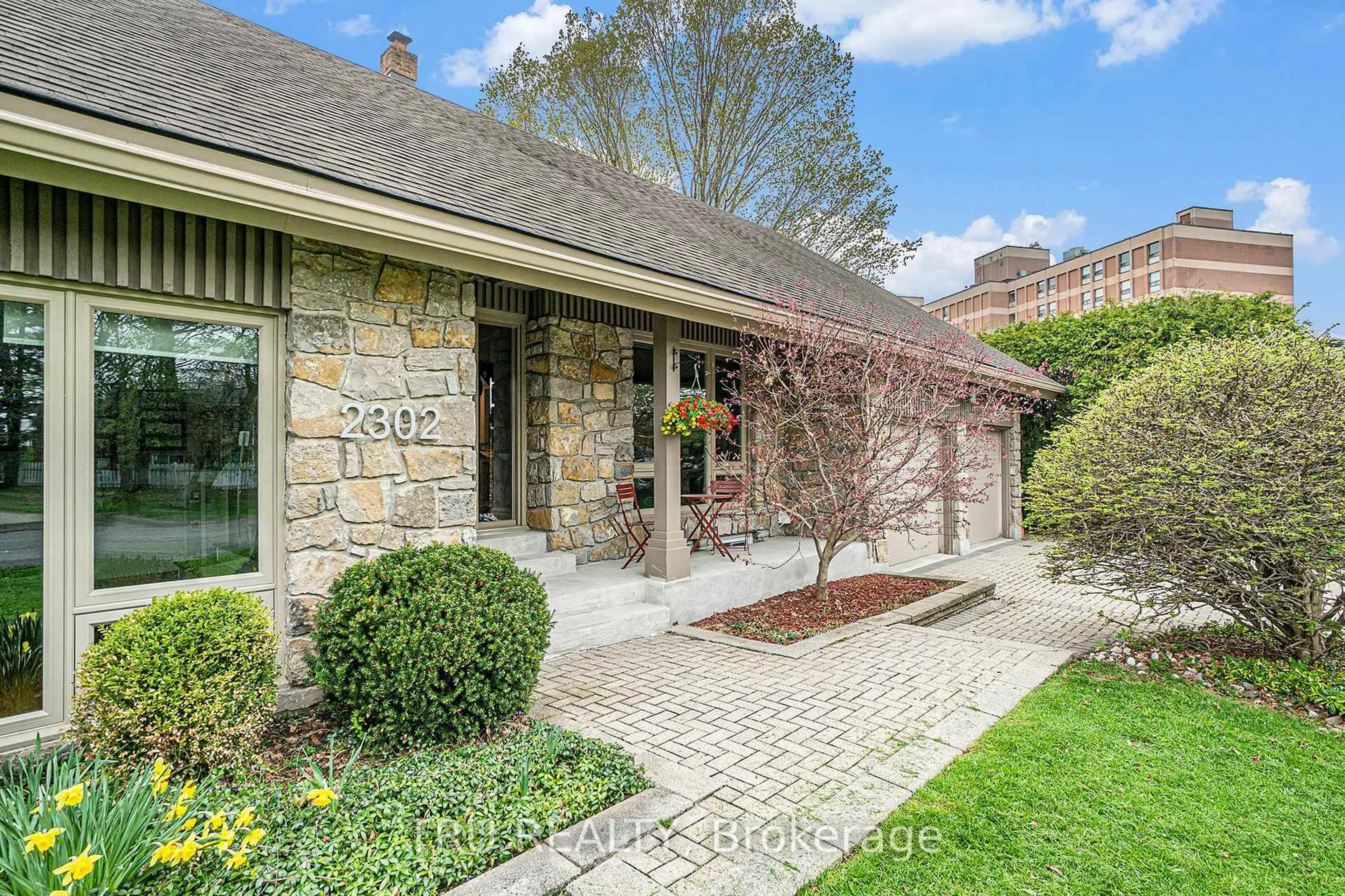 Home with brick exterior material, street for 2302 Fox Cres, Ottawa Ontario K2B 7K6