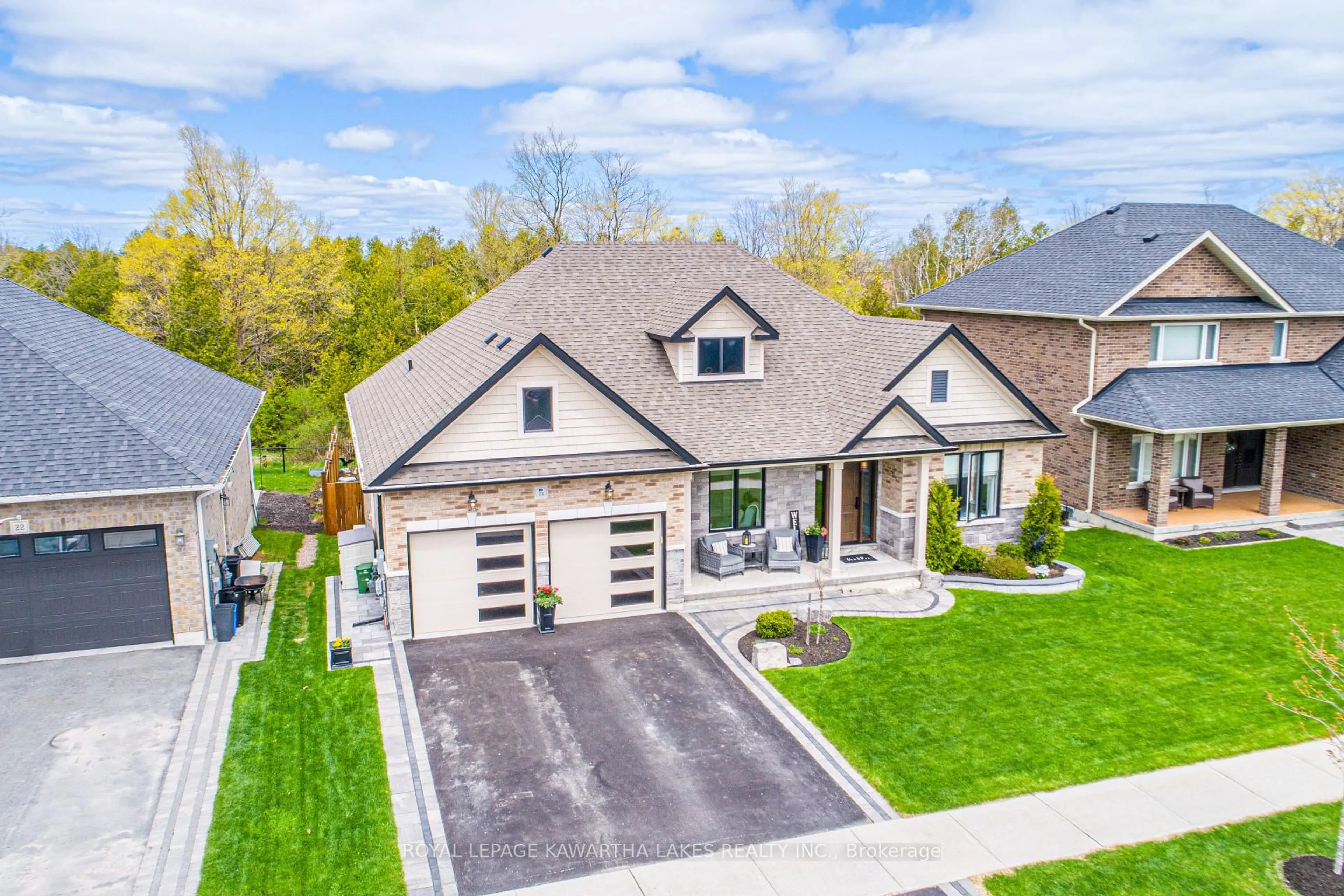 A pic from outside/outdoor area/front of a property/back of a property/a pic from drone, street for 24 Alcorn Dr, Kawartha Lakes Ontario K9V 0N1
