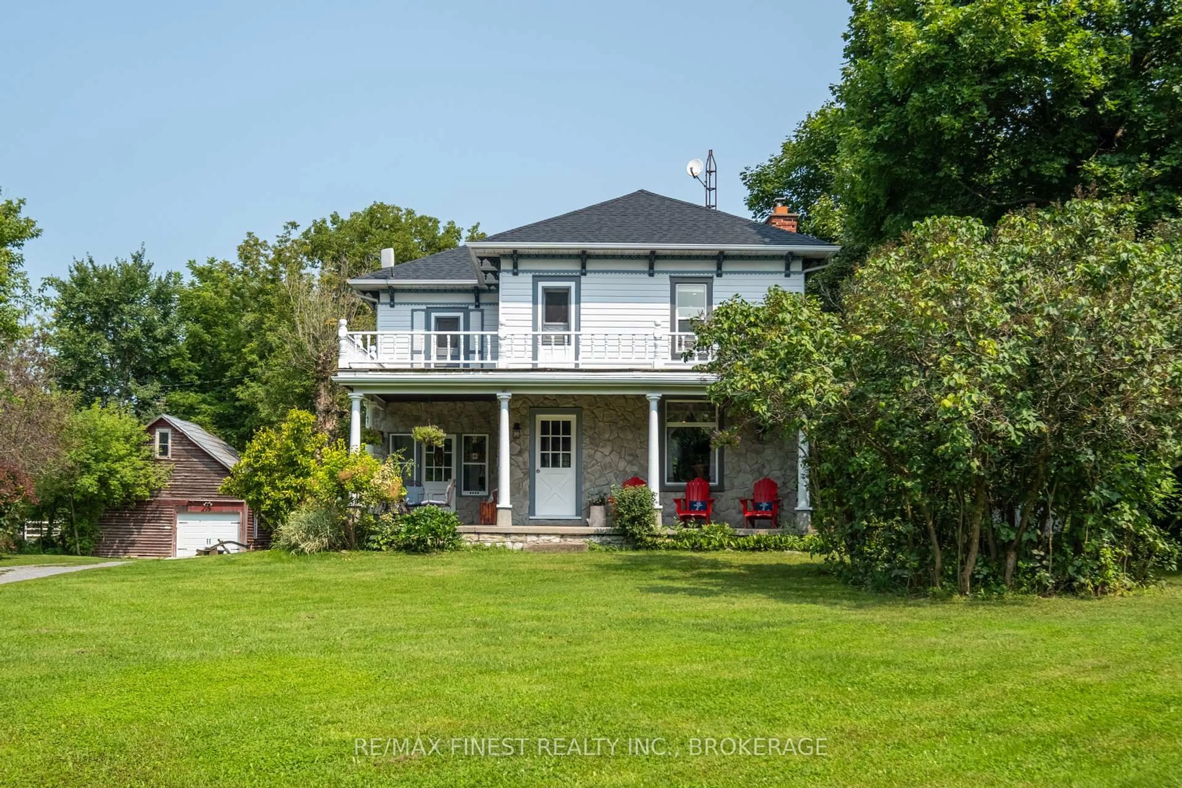 A pic from outside/outdoor area/front of a property/back of a property/a pic from drone, street for 4902 PETWORTH Rd, Harrowsmith Ontario K0H 1V0