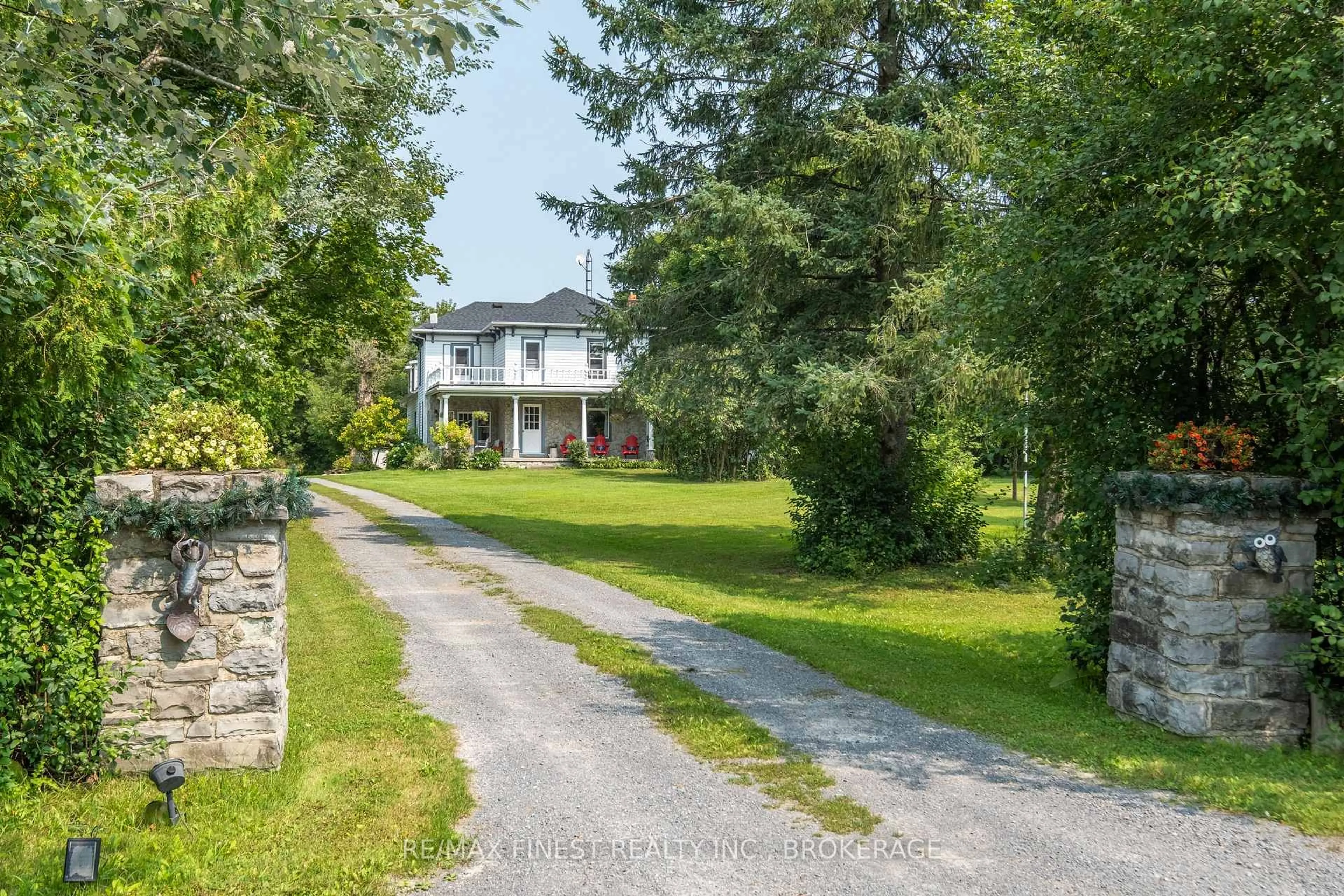 A pic from outside/outdoor area/front of a property/back of a property/a pic from drone, street for 4902 PETWORTH Rd, Harrowsmith Ontario K0H 1V0