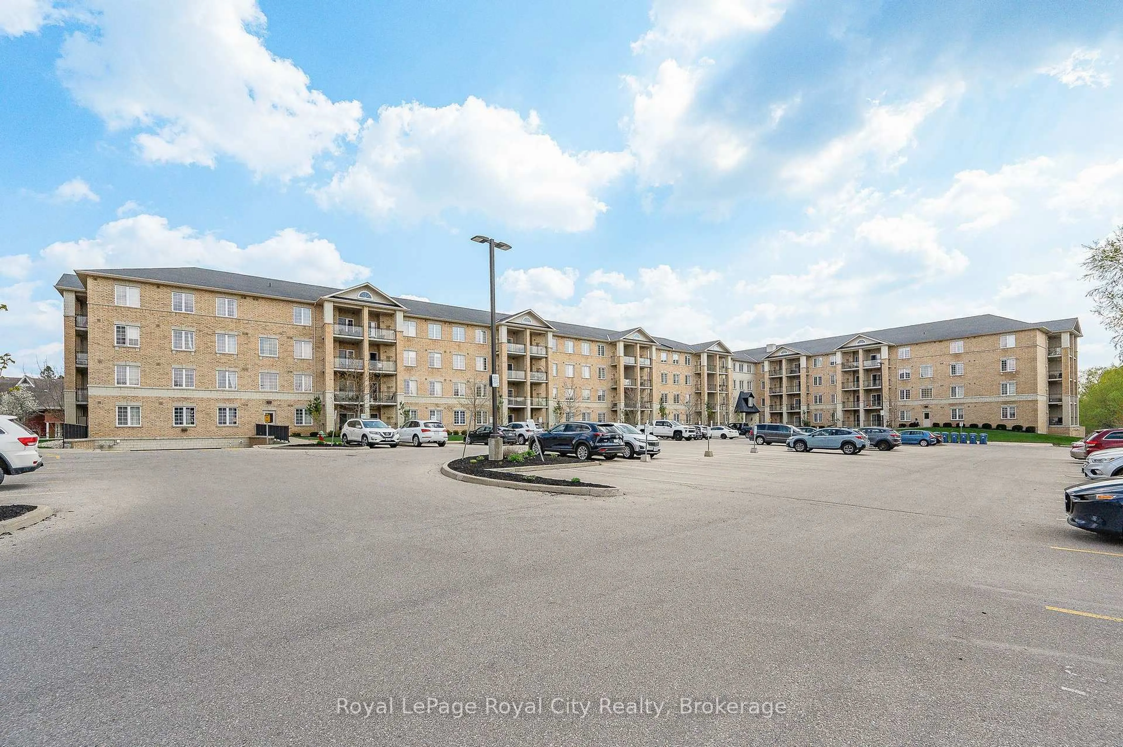 A pic from outside/outdoor area/front of a property/back of a property/a pic from drone, building for 1077 Gordon St #219, Guelph Ontario N1G 0E3