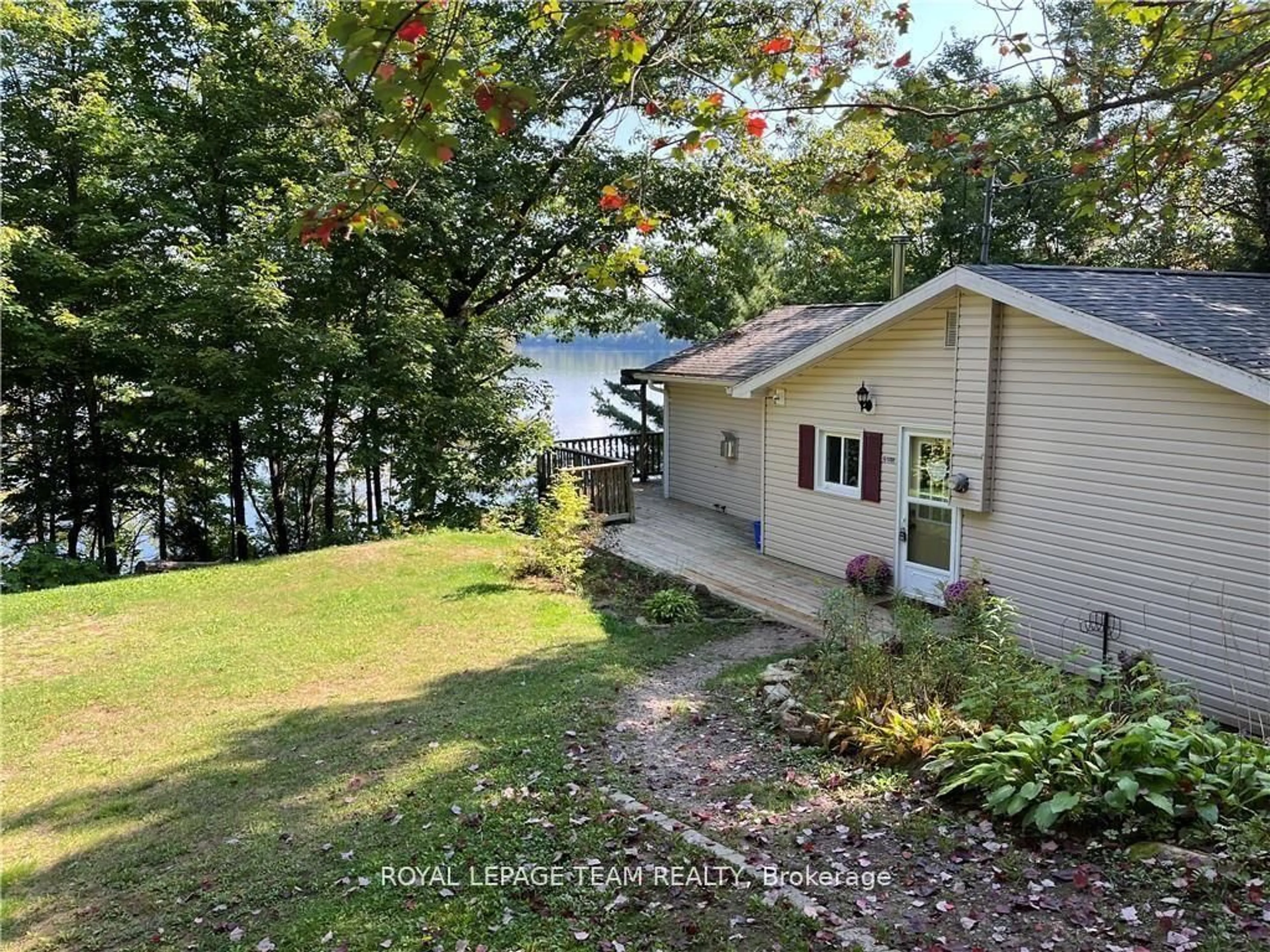 A pic from outside/outdoor area/front of a property/back of a property/a pic from drone, water/lake/river/ocean view for 1862 River Rd, Barry's Bay Ontario K0J 1B0