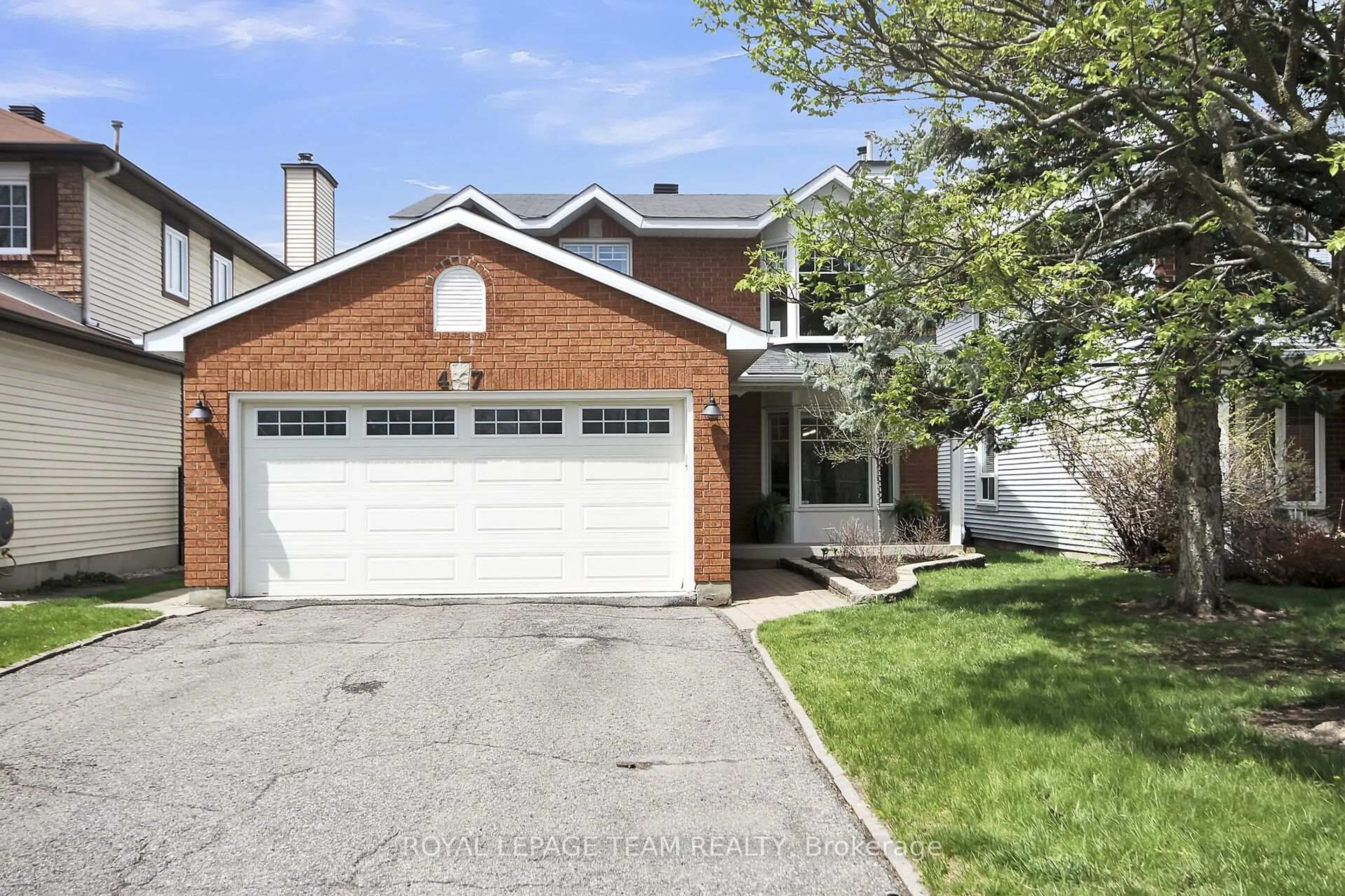 Home with brick exterior material, street for 47 Dossetter Way, Ottawa Ontario K1G 4S9