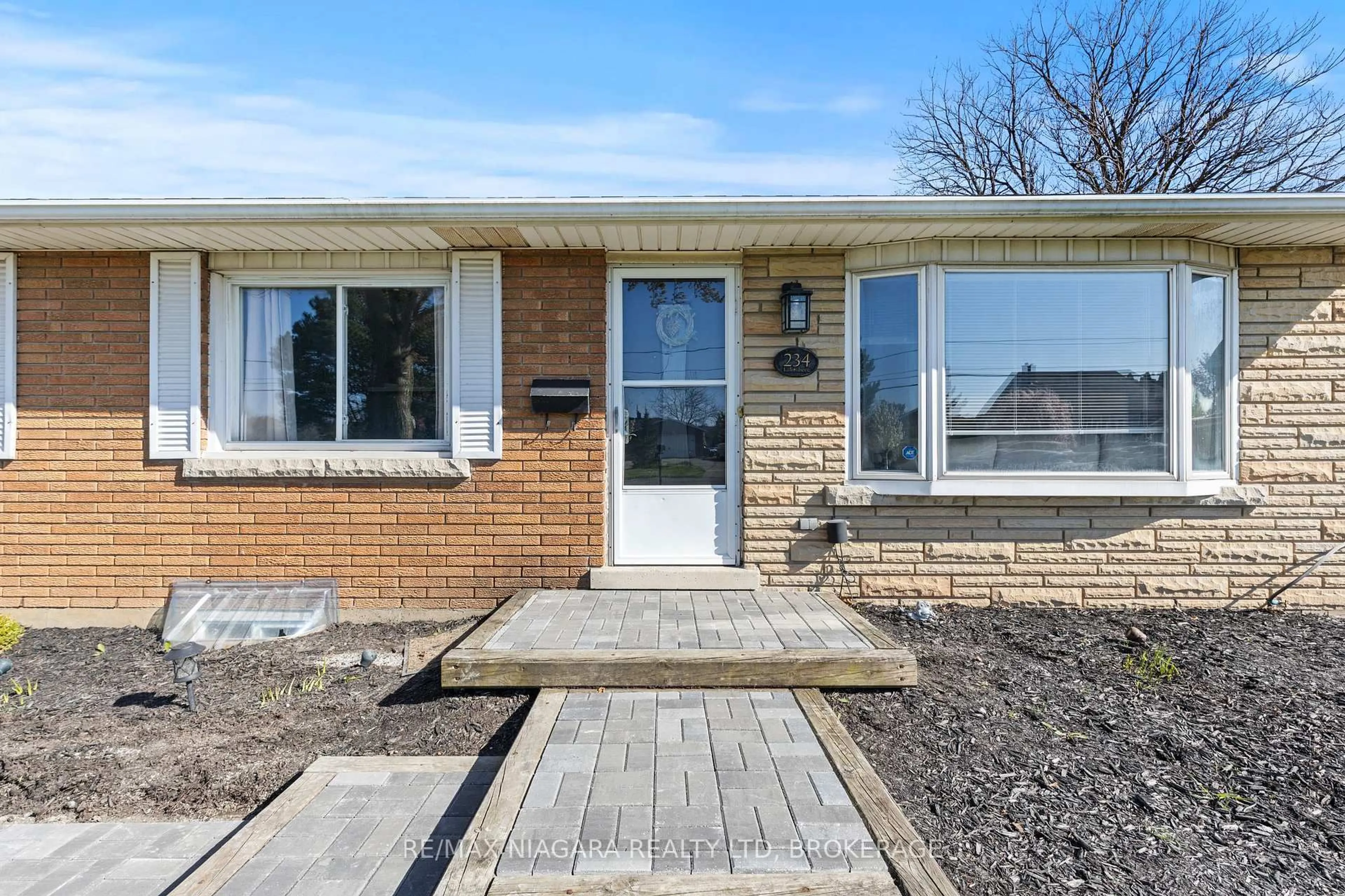 Home with brick exterior material, street for 234 Lakeshore Rd, St. Catharines Ontario L2M 1R5