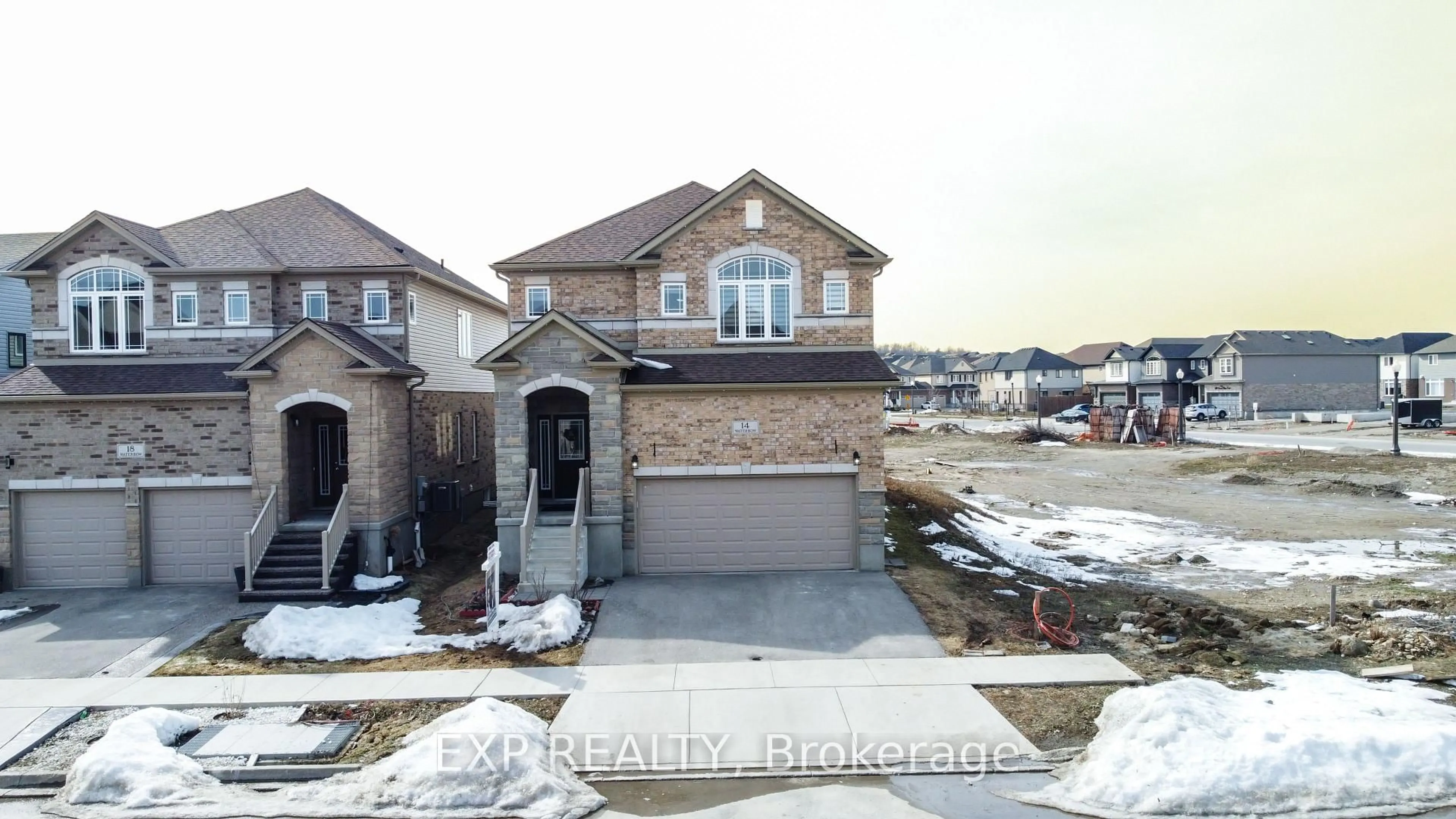 Home with brick exterior material, street for 14 WATERBOW Tr, Kitchener Ontario N2A 0K7
