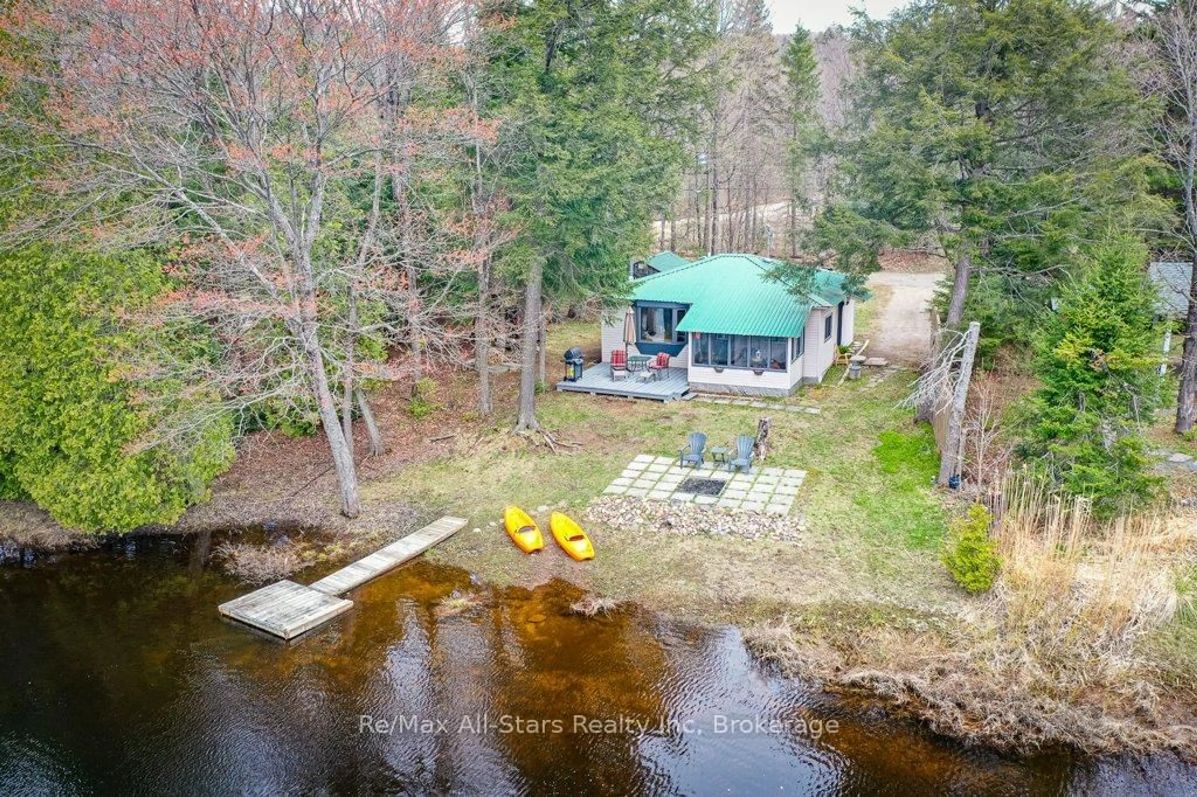 A pic from outside/outdoor area/front of a property/back of a property/a pic from drone, water/lake/river/ocean view for 1054 Keysbury Dr, Algonquin Highlands Ontario P0A 1H0