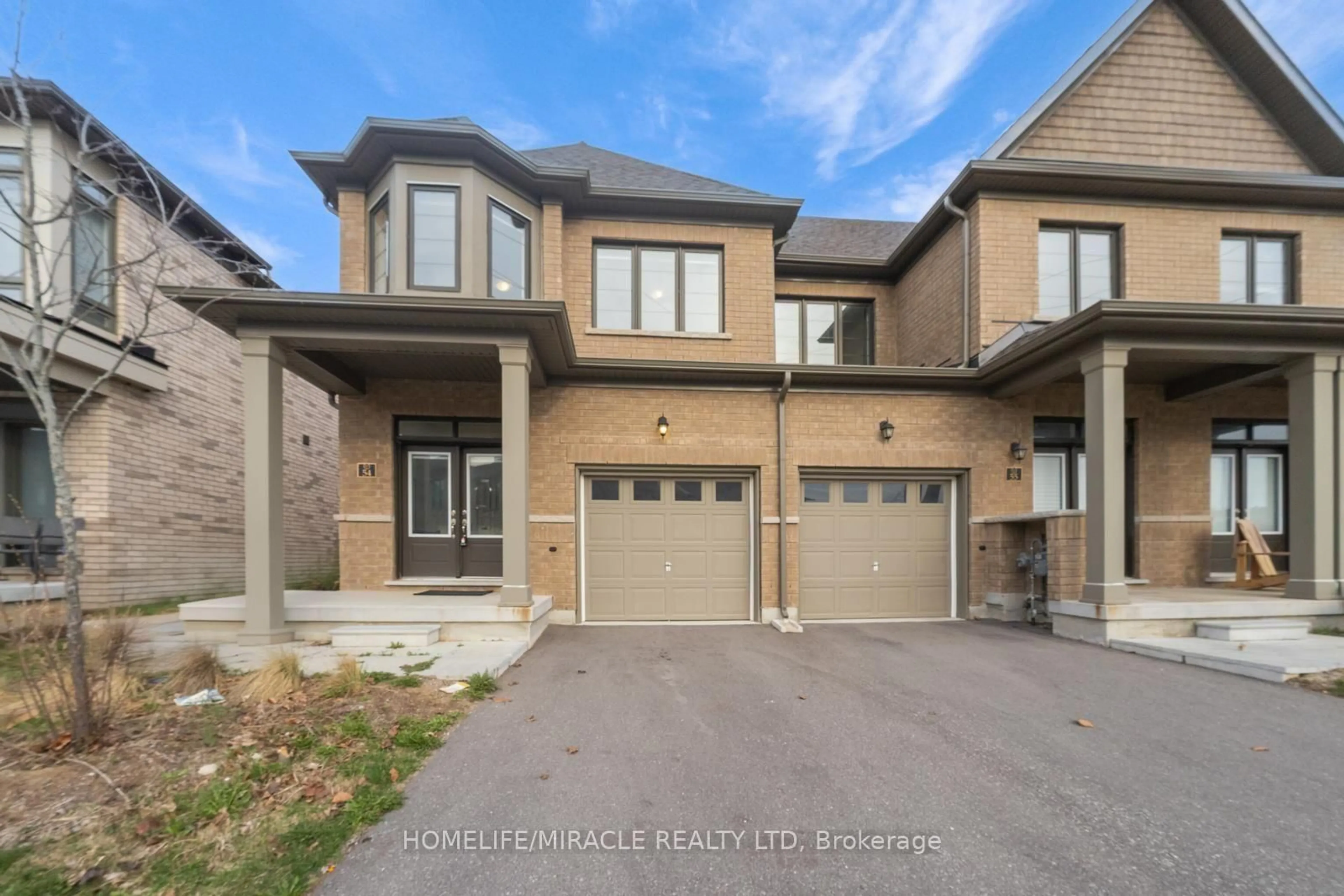 Home with brick exterior material, street for 166 Deerpath Dr #54, Guelph Ontario N1K 1W6