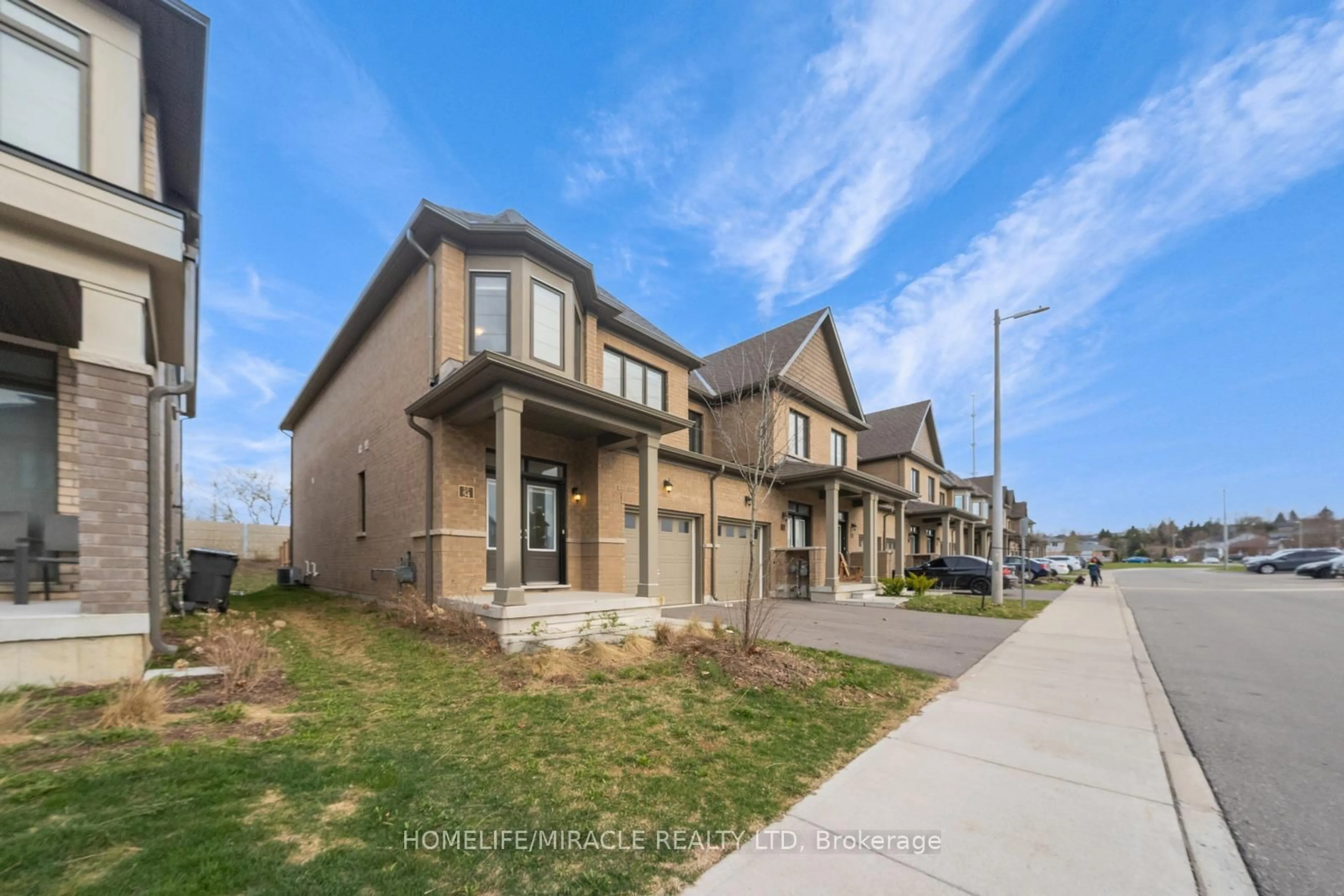 Home with brick exterior material, street for 166 Deerpath Dr #54, Guelph Ontario N1K 1W6