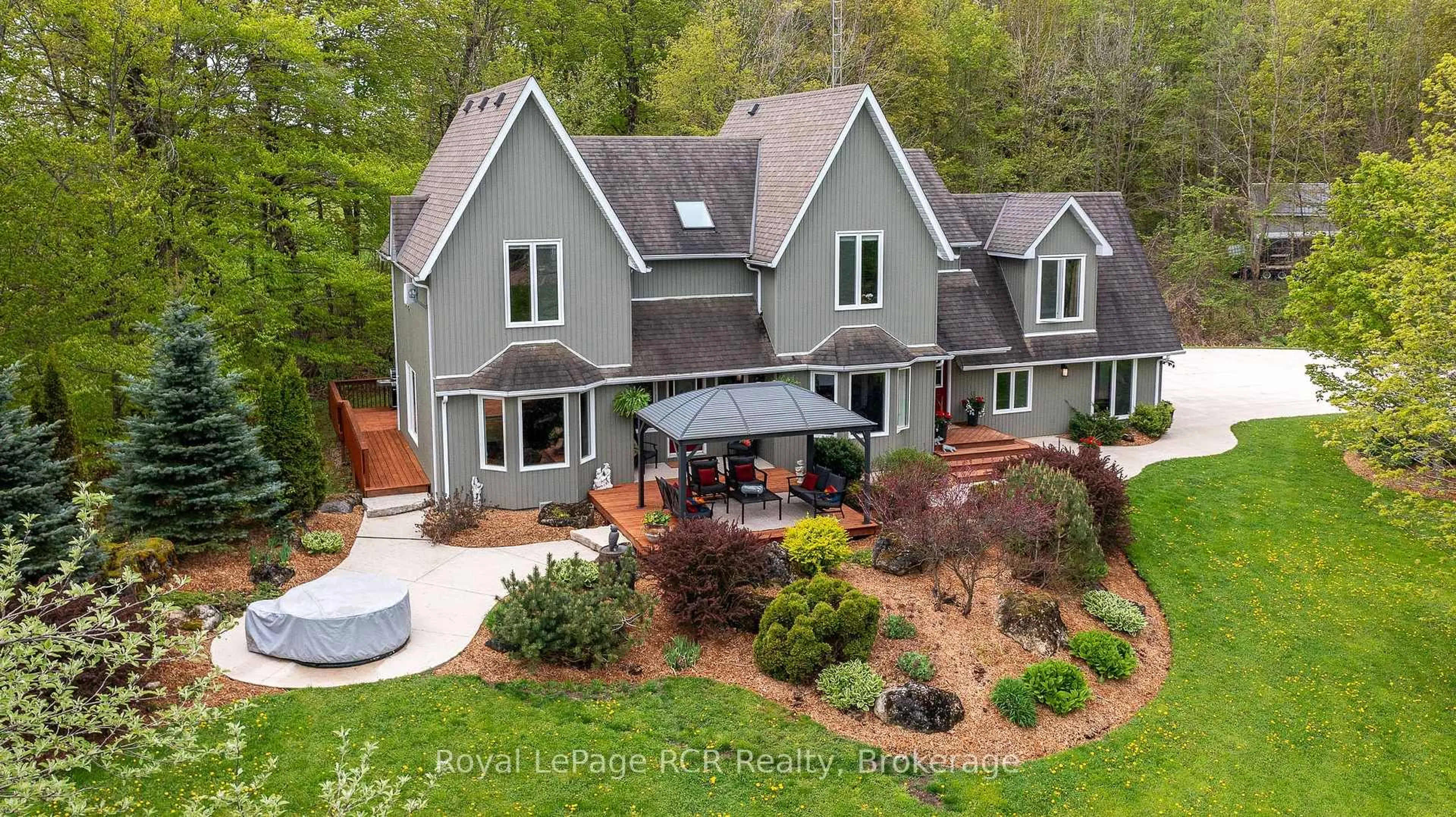 A pic from outside/outdoor area/front of a property/back of a property/a pic from drone, unknown for 714329 Baseline Rd, Grey Highlands Ontario N0C 1E0