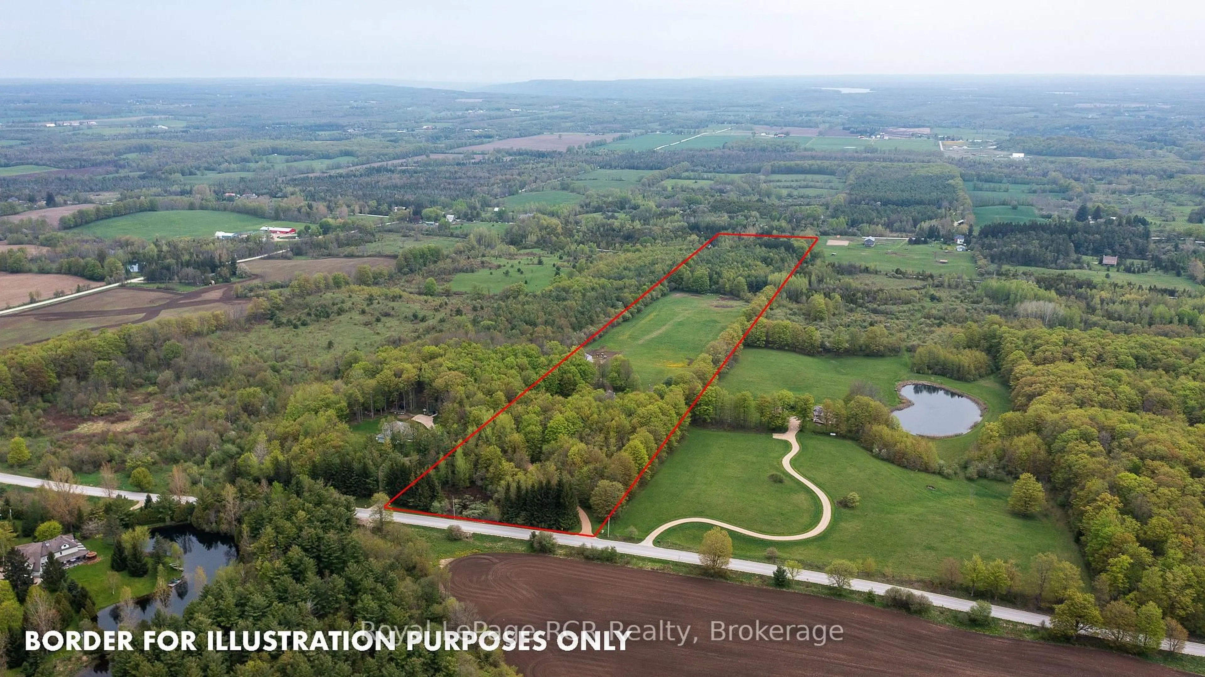A pic from outside/outdoor area/front of a property/back of a property/a pic from drone, forest/trees view for 714329 Baseline Rd, Grey Highlands Ontario N0C 1E0
