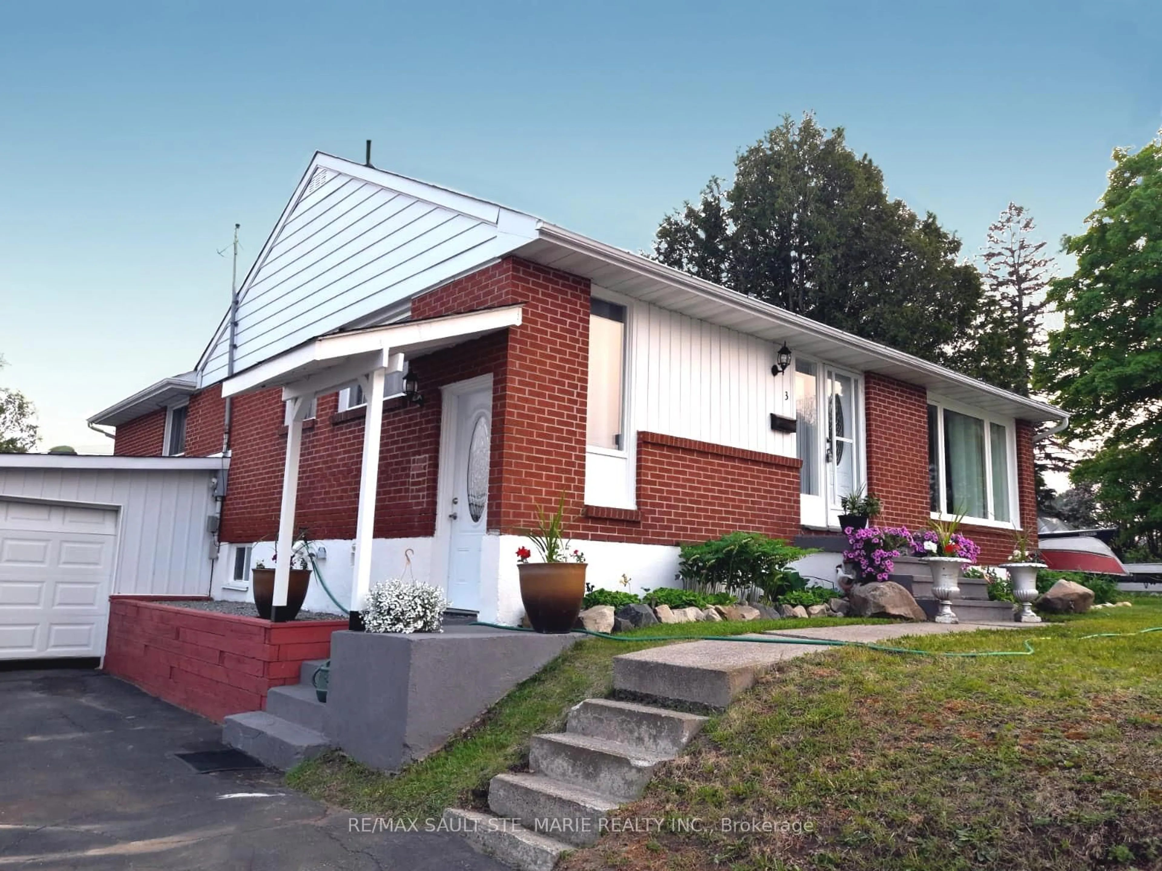 Home with brick exterior material, street for 3 Hart Rd, Elliot Lake Ontario P5A 1P7
