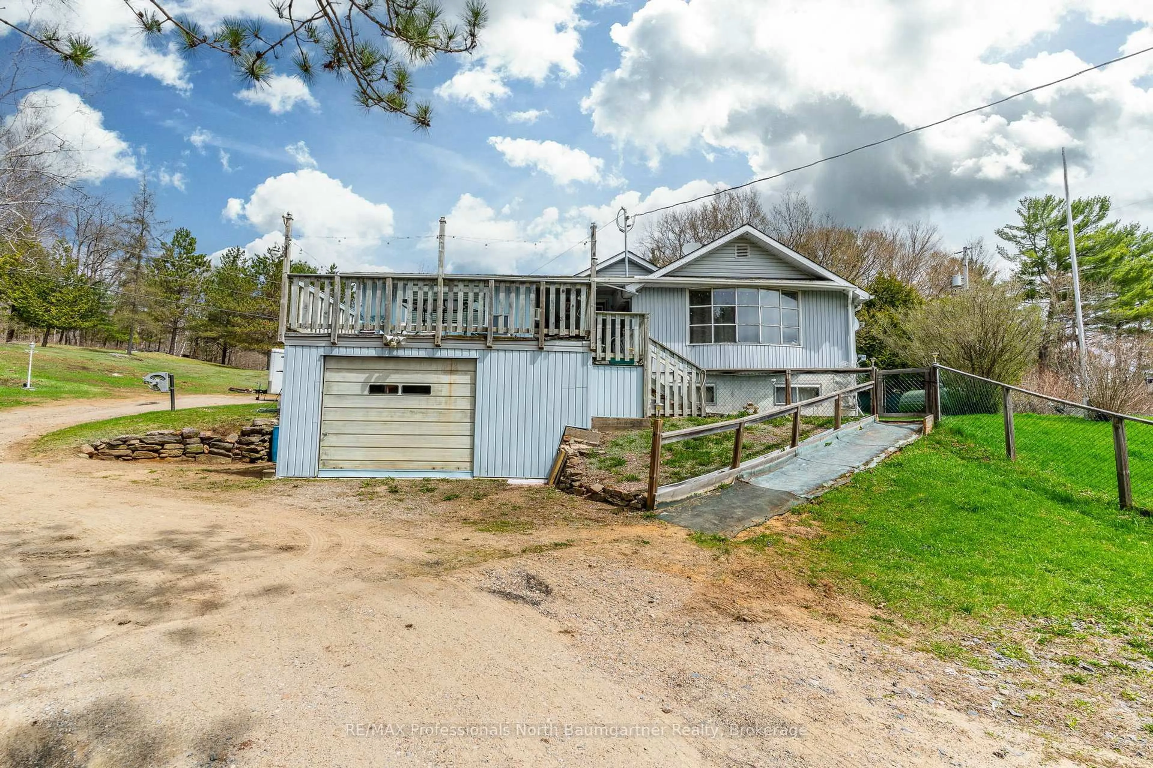 A pic from outside/outdoor area/front of a property/back of a property/a pic from drone, unknown for 1093 Reynolds Rd, Minden Hills Ontario K0M 2K0