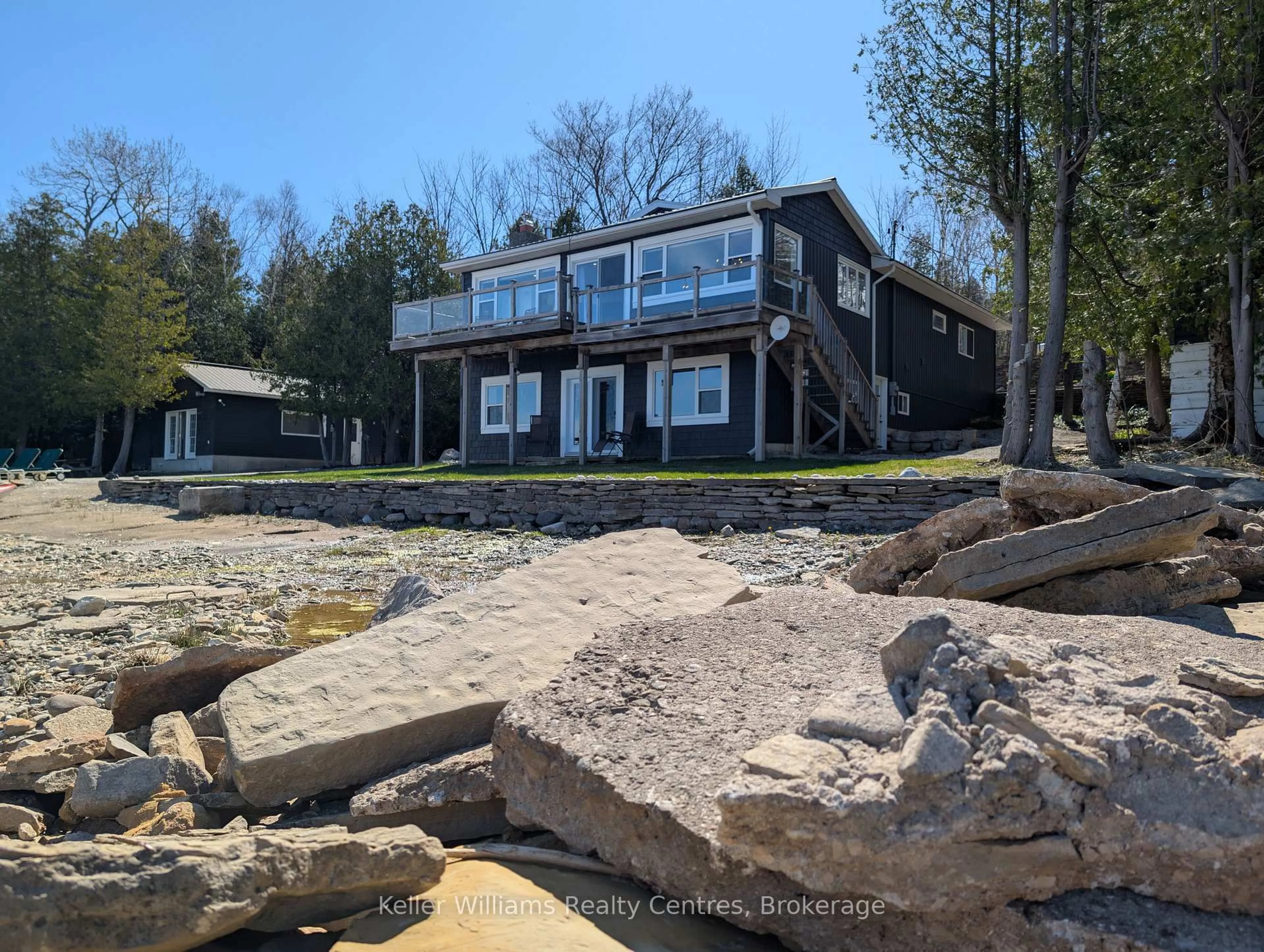 A pic from outside/outdoor area/front of a property/back of a property/a pic from drone, water/lake/river/ocean view for 502453 GREY ROAD 1 N/A, Georgian Bluffs Ontario N0H 2T0