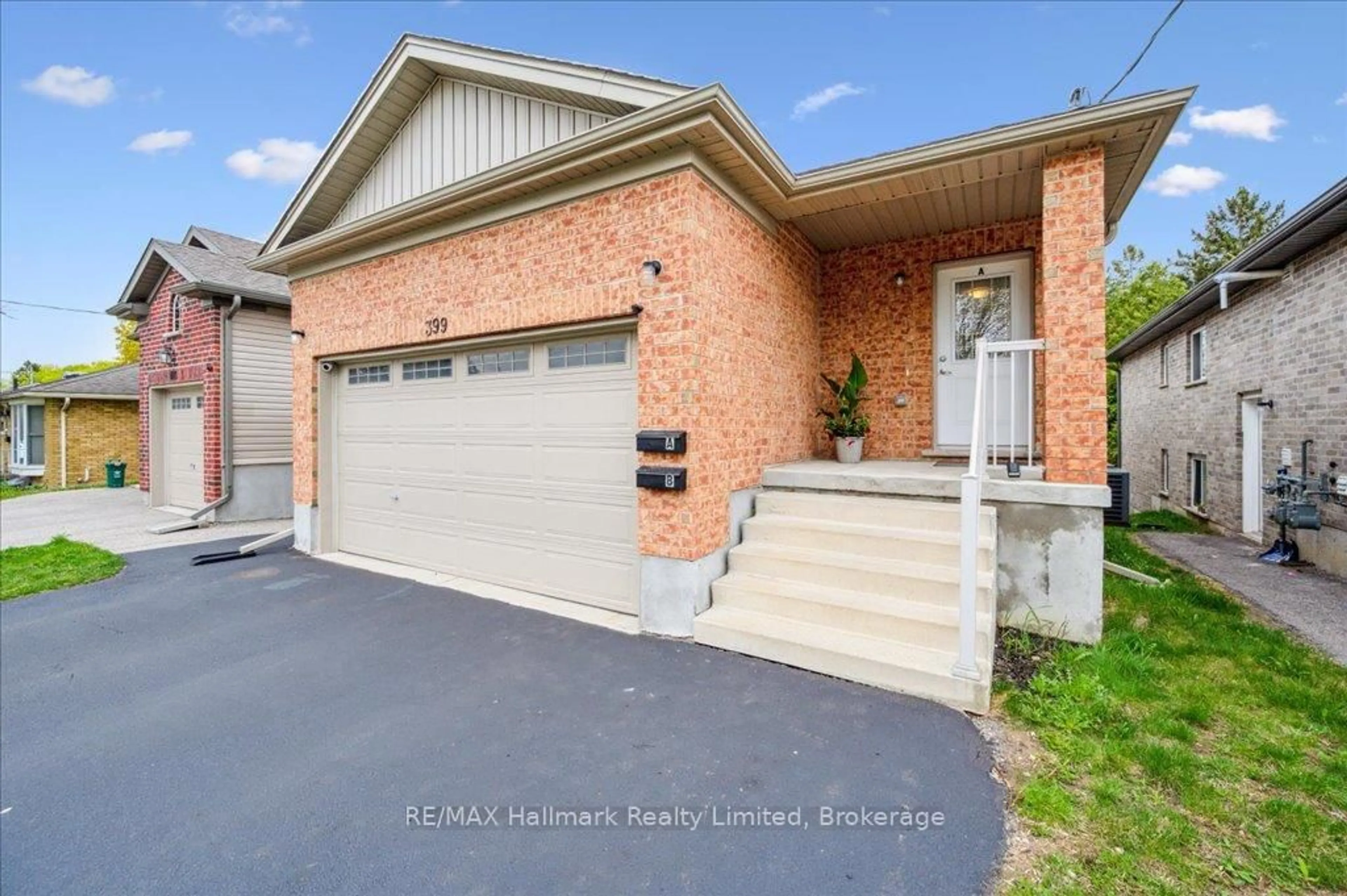 Home with brick exterior material, street for 399 Greenfield Ave, Kitchener Ontario N2C 1E6