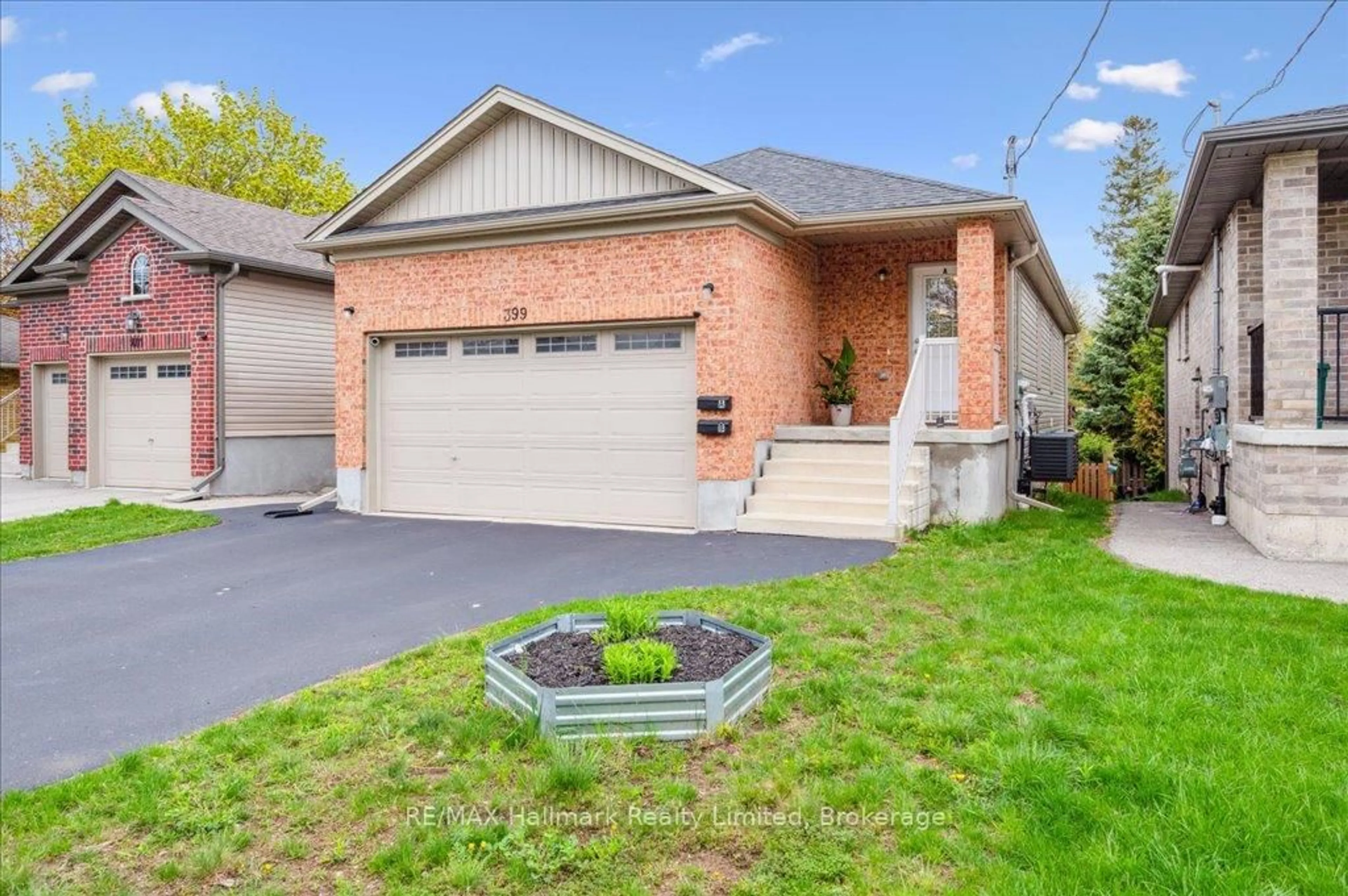 Home with brick exterior material, street for 399 Greenfield Ave, Kitchener Ontario N2C 1E6