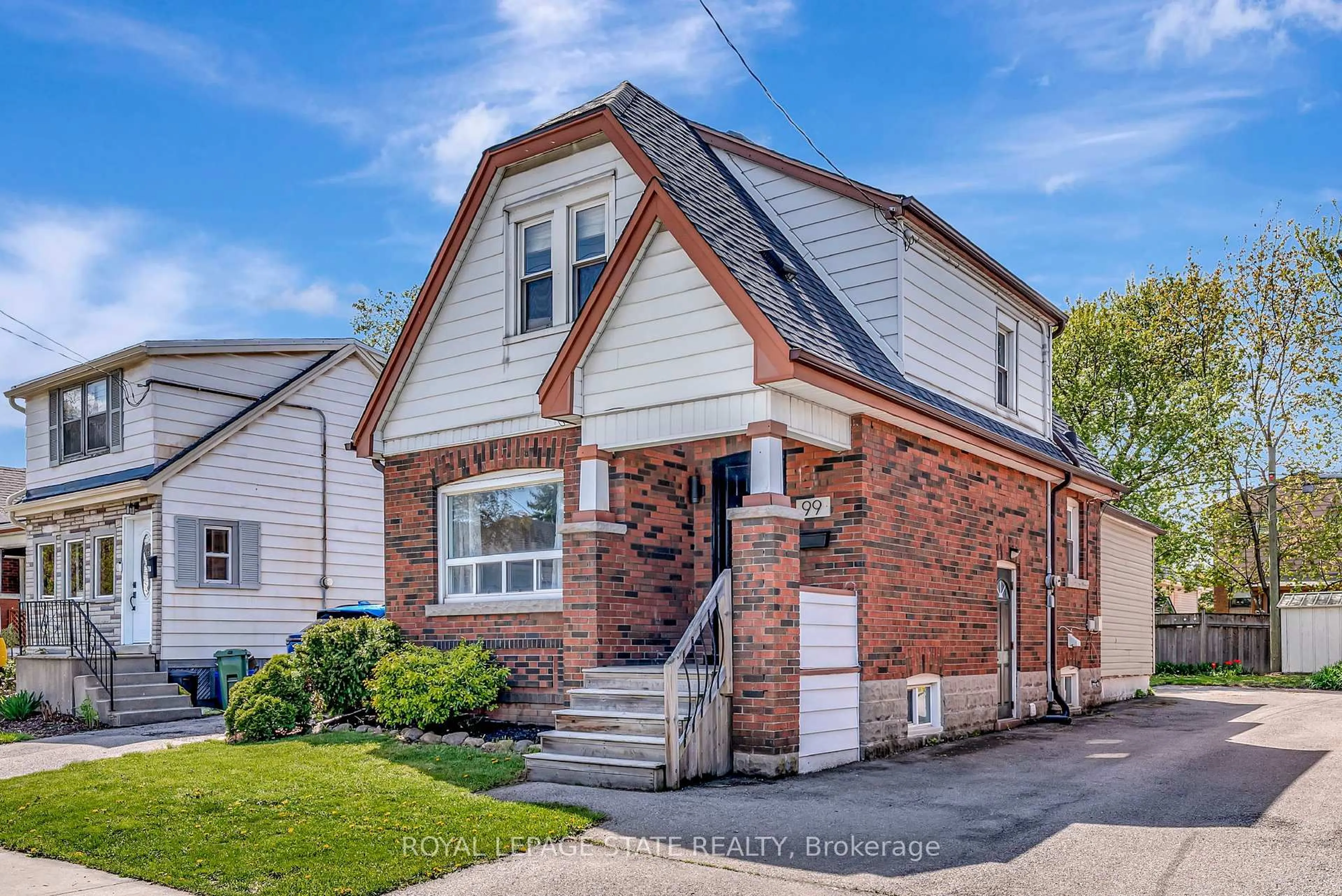 Home with brick exterior material, street for 99 Cope St, Hamilton Ontario L8H 5B1
