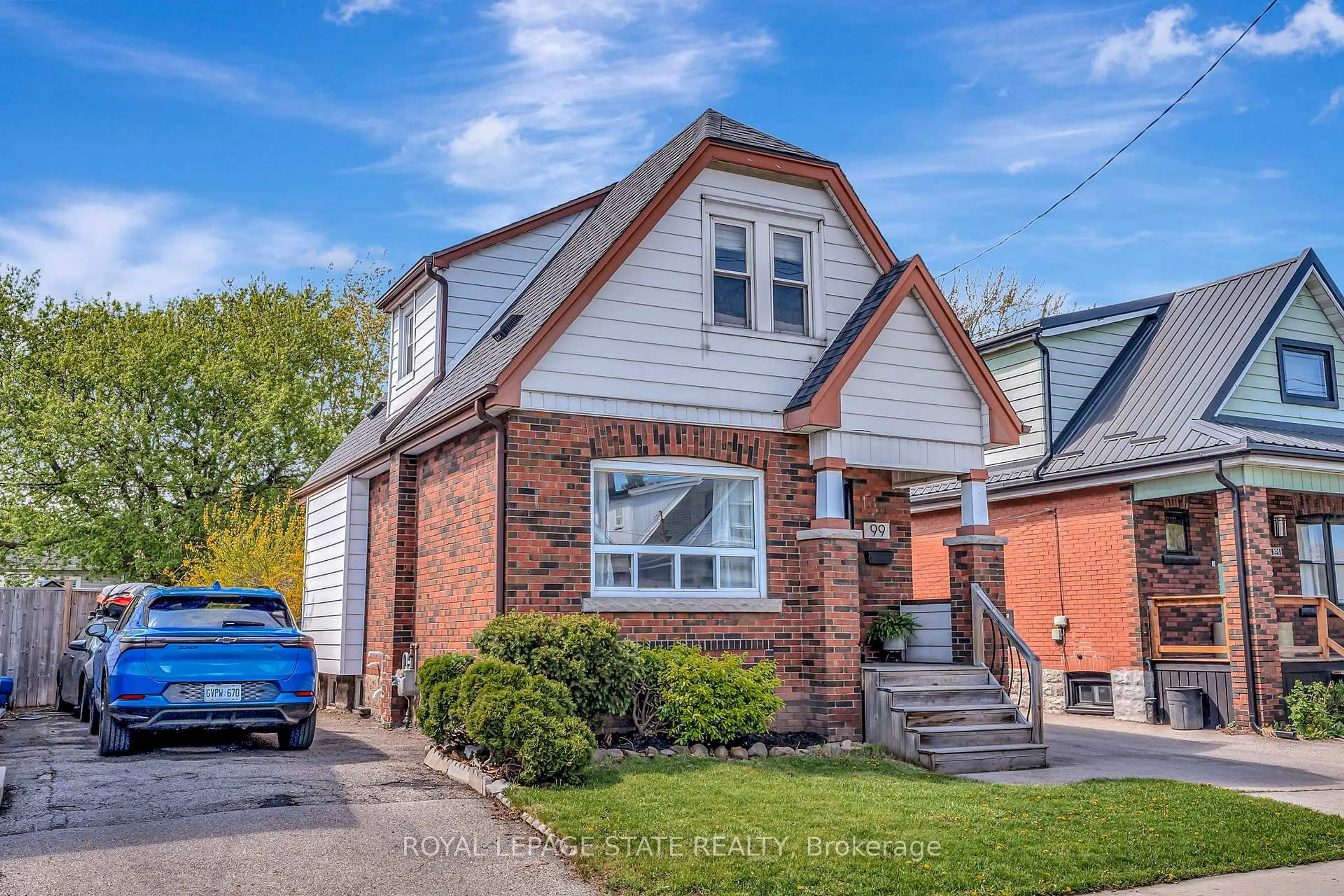 Home with brick exterior material, street for 99 Cope St, Hamilton Ontario L8H 5B1