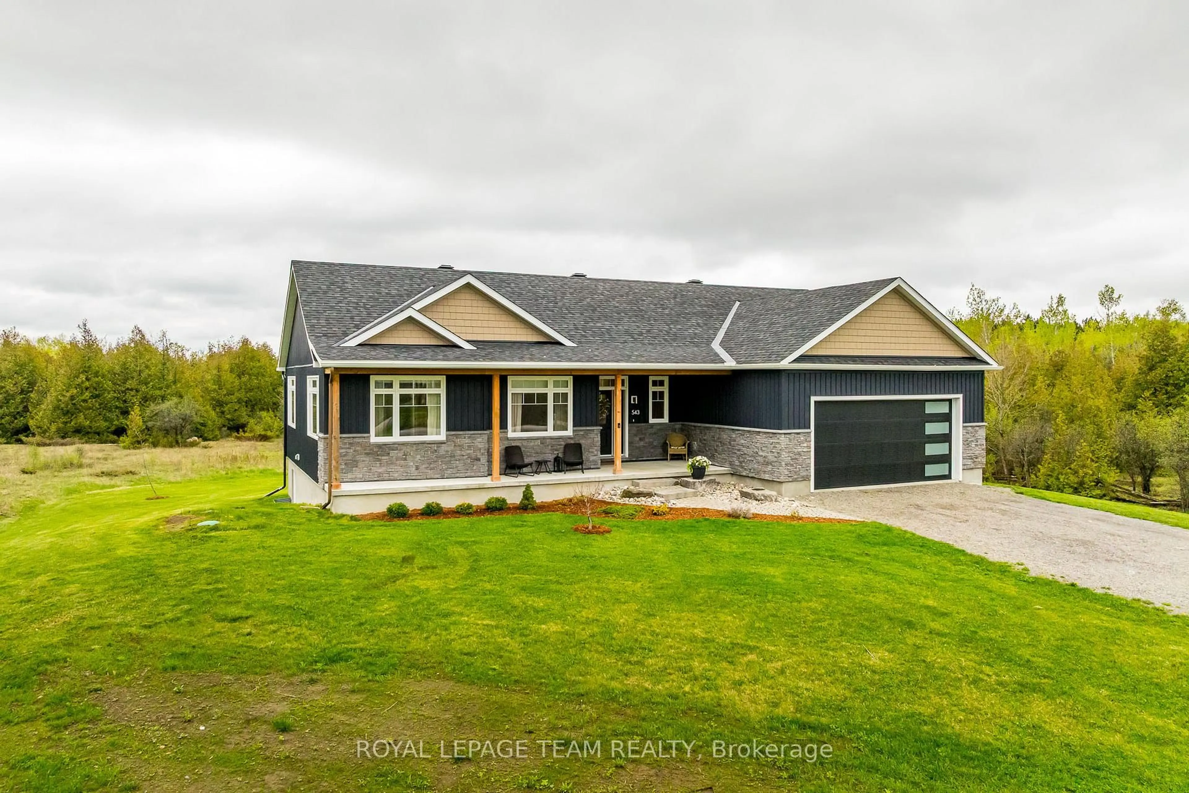 Home with vinyl exterior material, street for 543 Mccrea Rd, Merrickville Ontario K0G 1N0