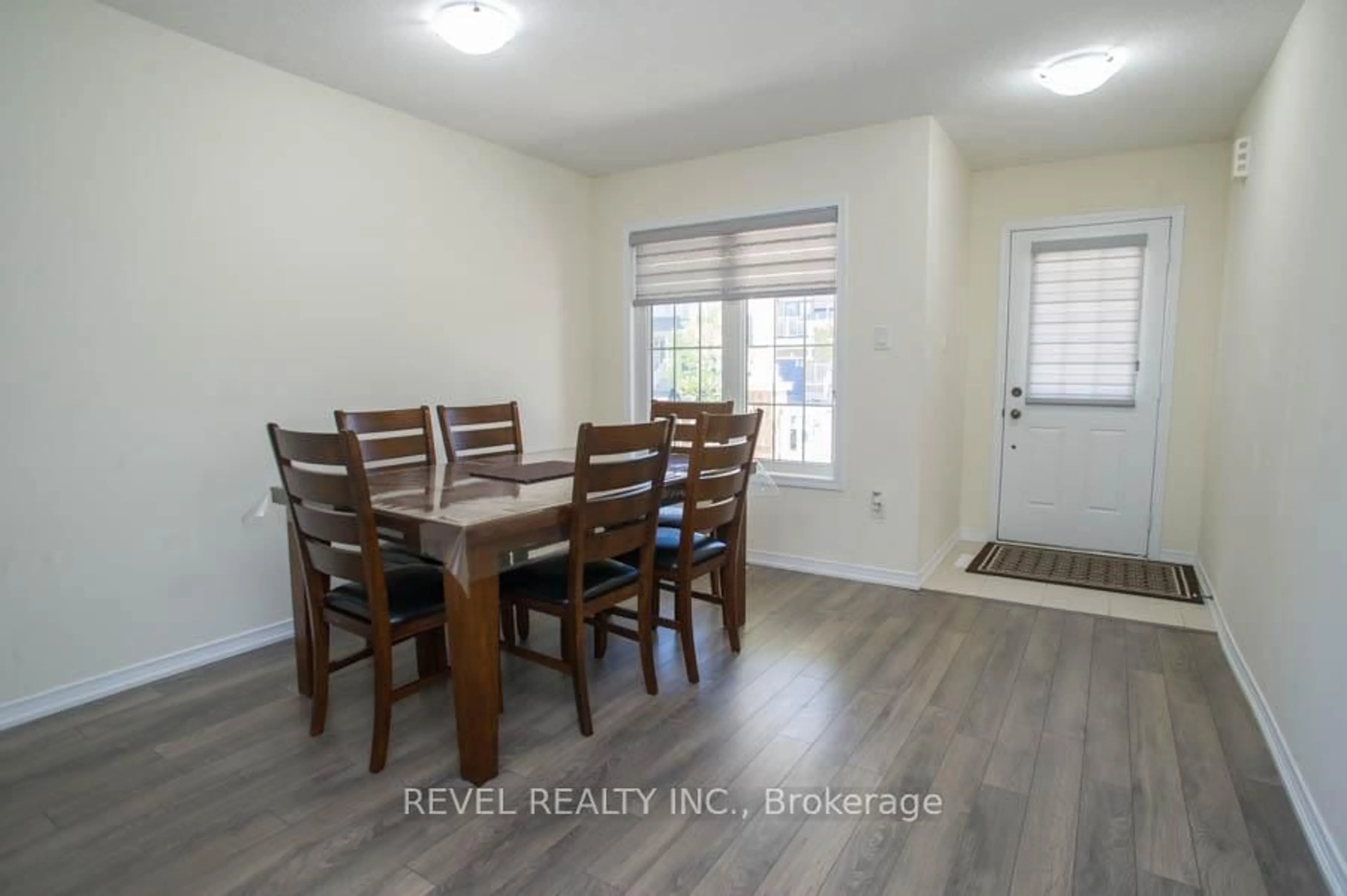 Dining room, wood/laminate floor for 88 Warner Lane, Brantford Ontario N3T 0J3