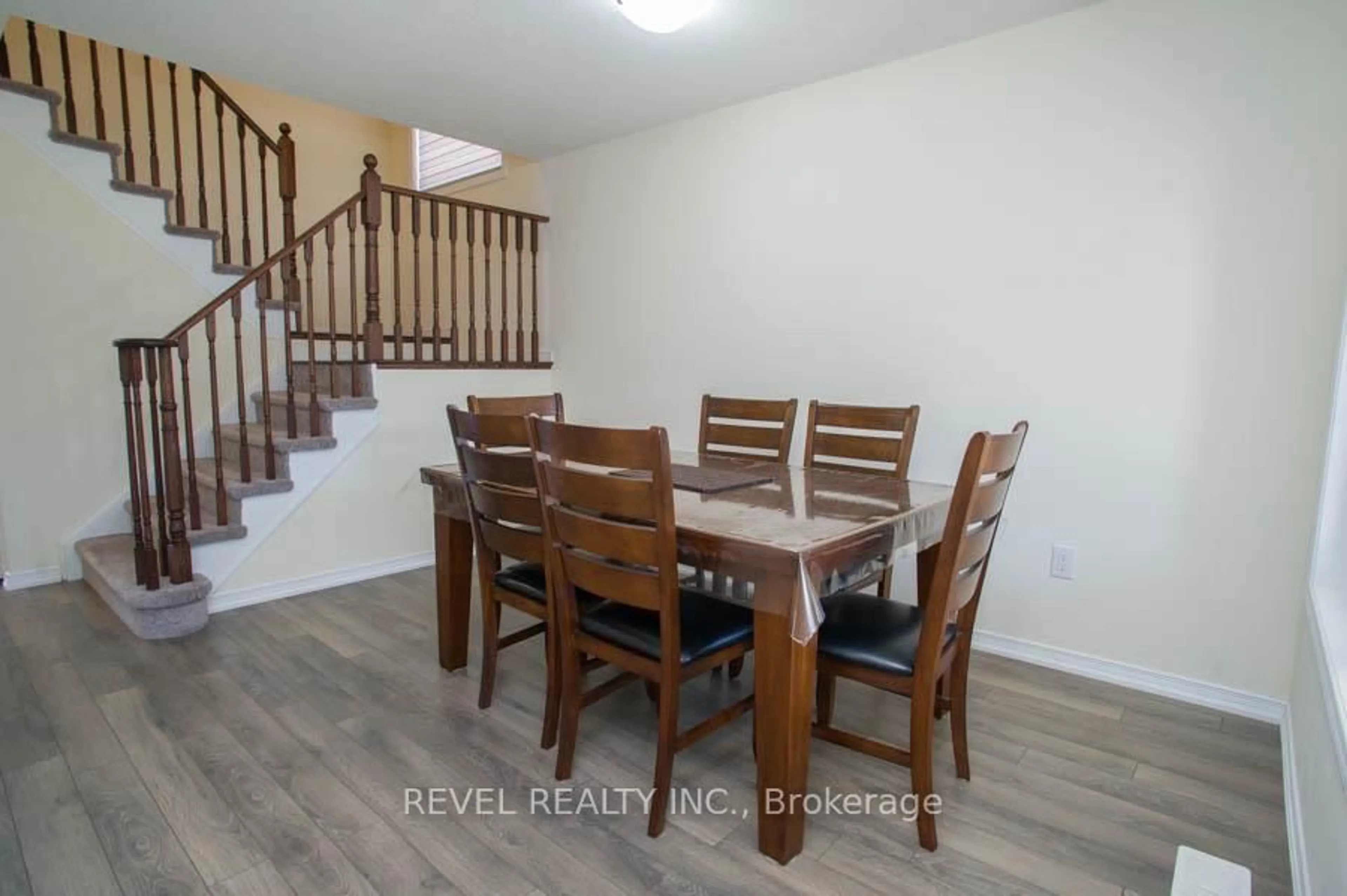 Dining room, wood/laminate floor for 88 Warner Lane, Brantford Ontario N3T 0J3