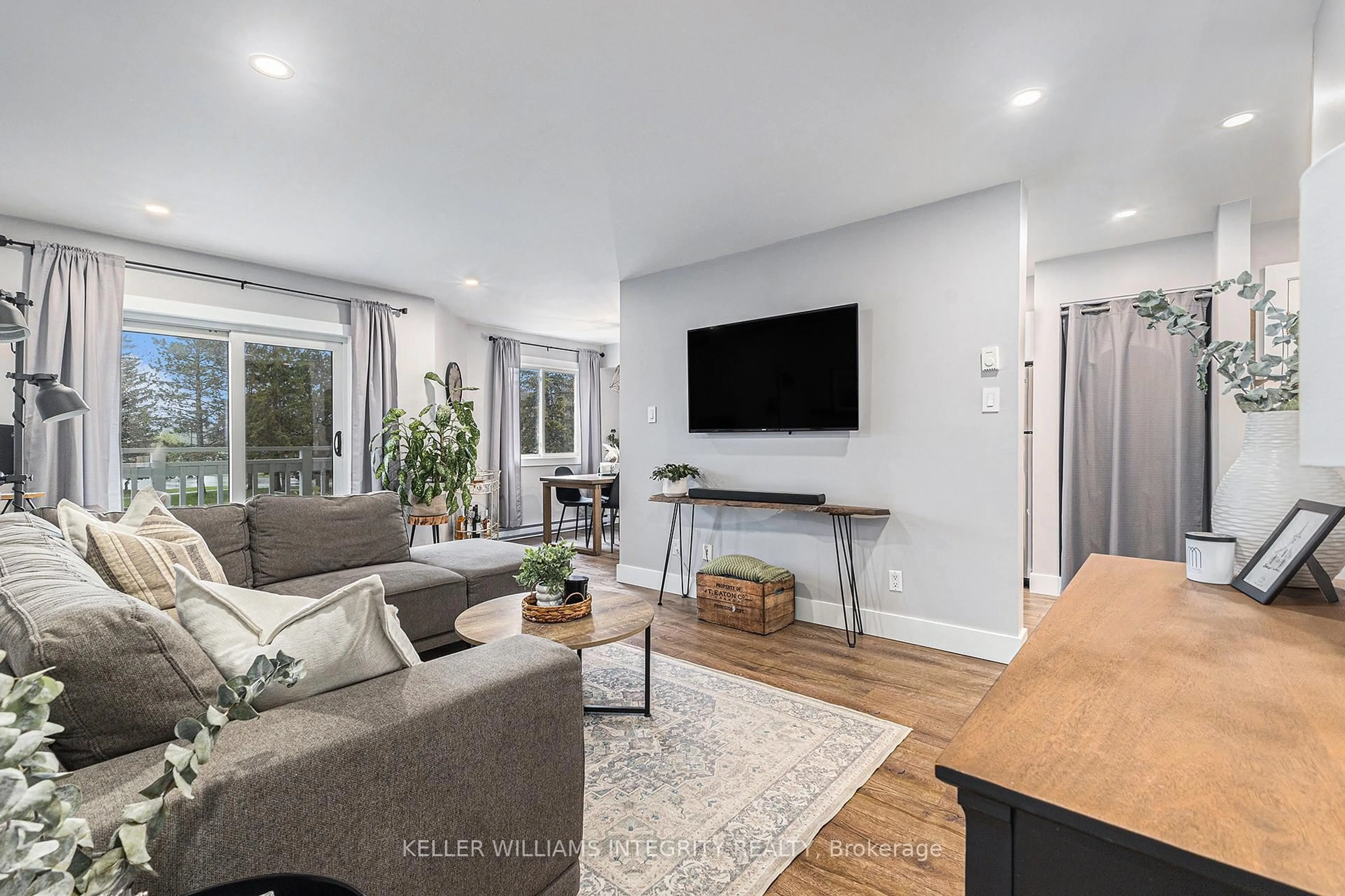 Living room with furniture, unknown for 270 Lorry Greenberg Dr #108, Ottawa Ontario K1T 3K2