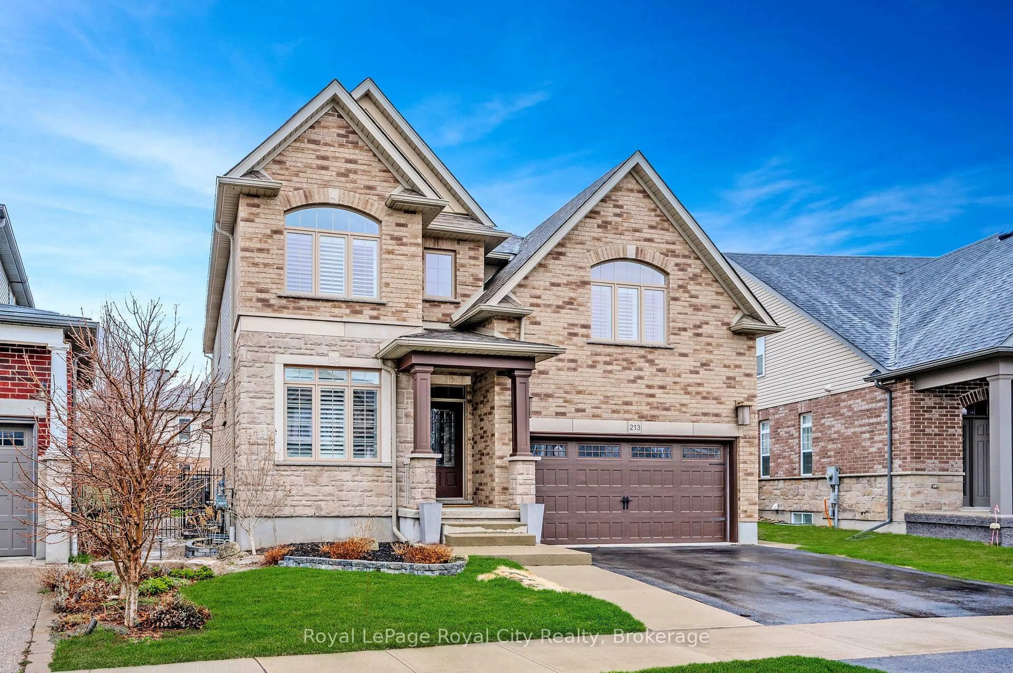 Home with brick exterior material, street for 213 Tremaine Cres, Kitchener Ontario N2A 4L9