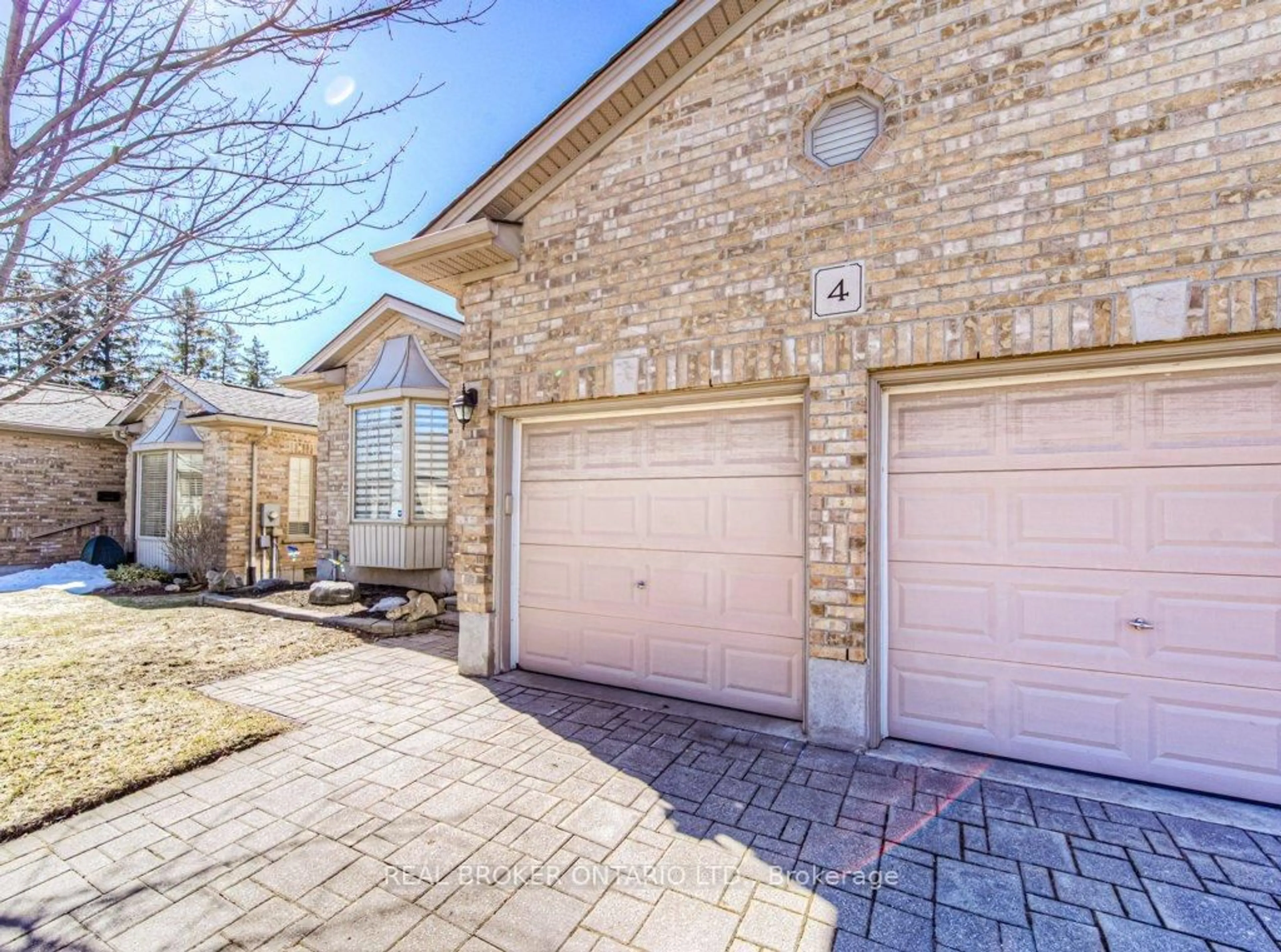 Home with brick exterior material, street for 900 Doon Village Rd #4, Kitchener Ontario N2P 1A4
