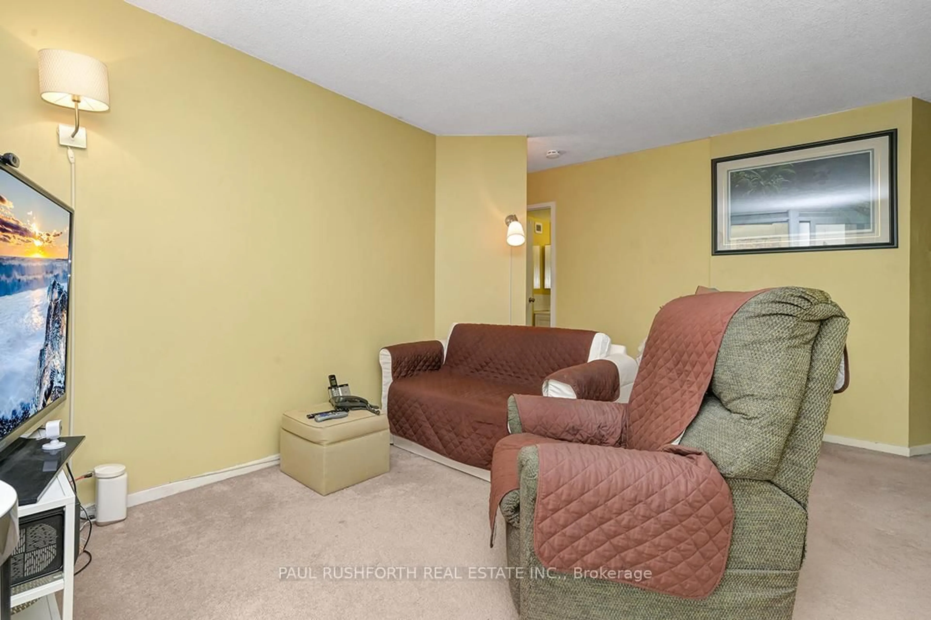 Living room with furniture, carpet floor for 900 Dynes Rd #2008, Ottawa Ontario K2C 3L6