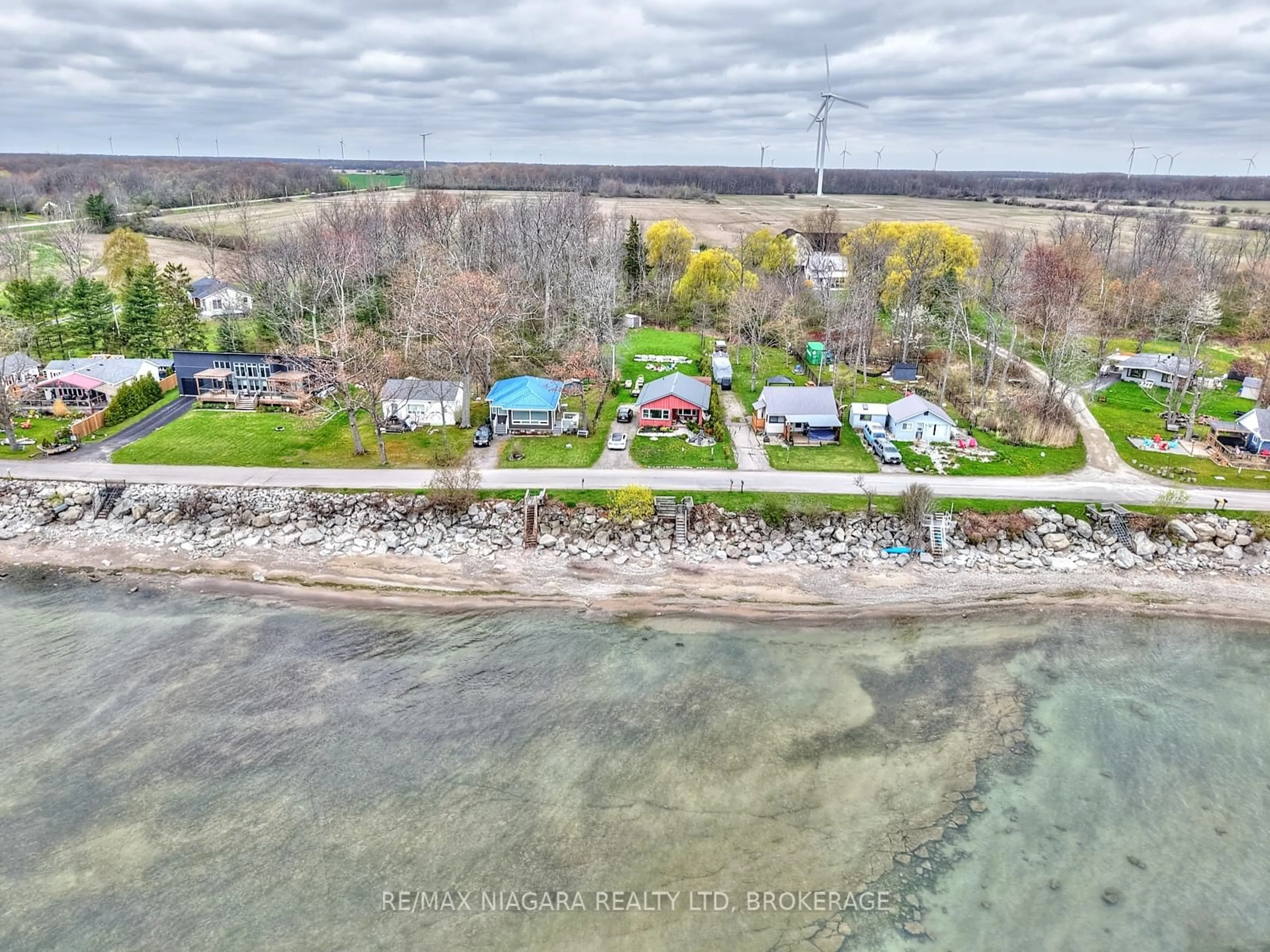 A pic from outside/outdoor area/front of a property/back of a property/a pic from drone, water/lake/river/ocean view for 2401 Lakeshore Rd, Haldimand Ontario N1A 2W8