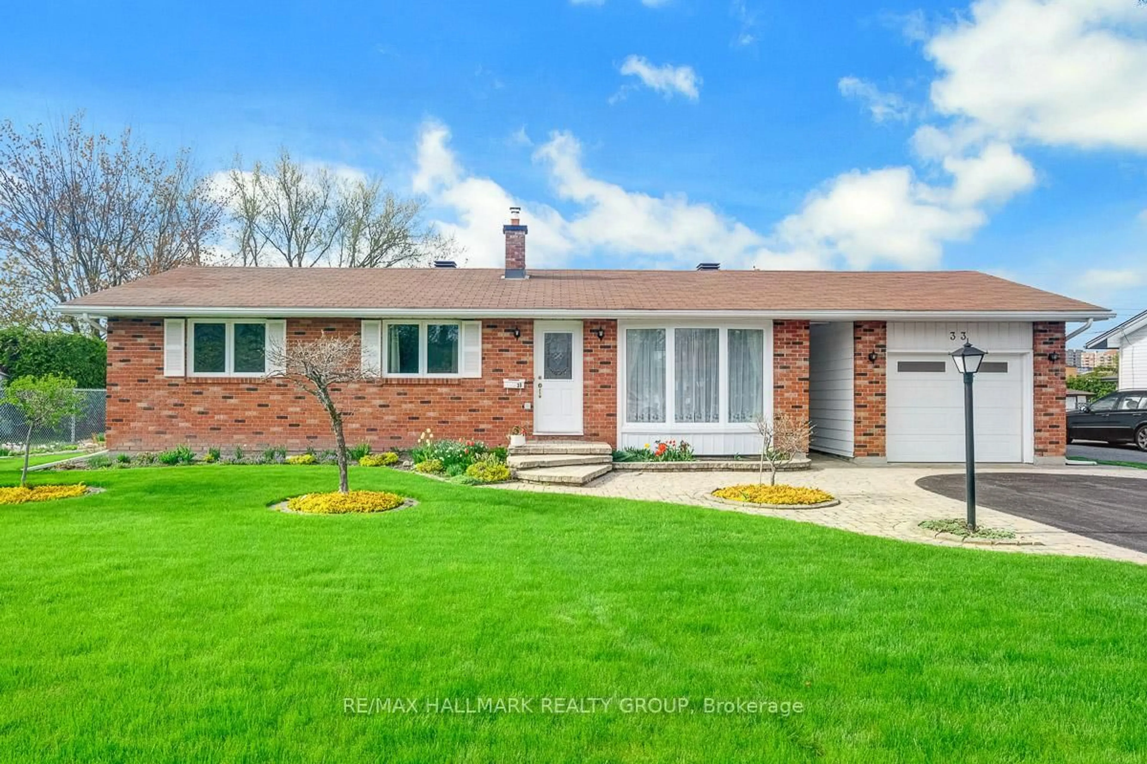 Home with brick exterior material, street for 33 Glenmanor Dr, Ottawa Ontario K2G 3E9