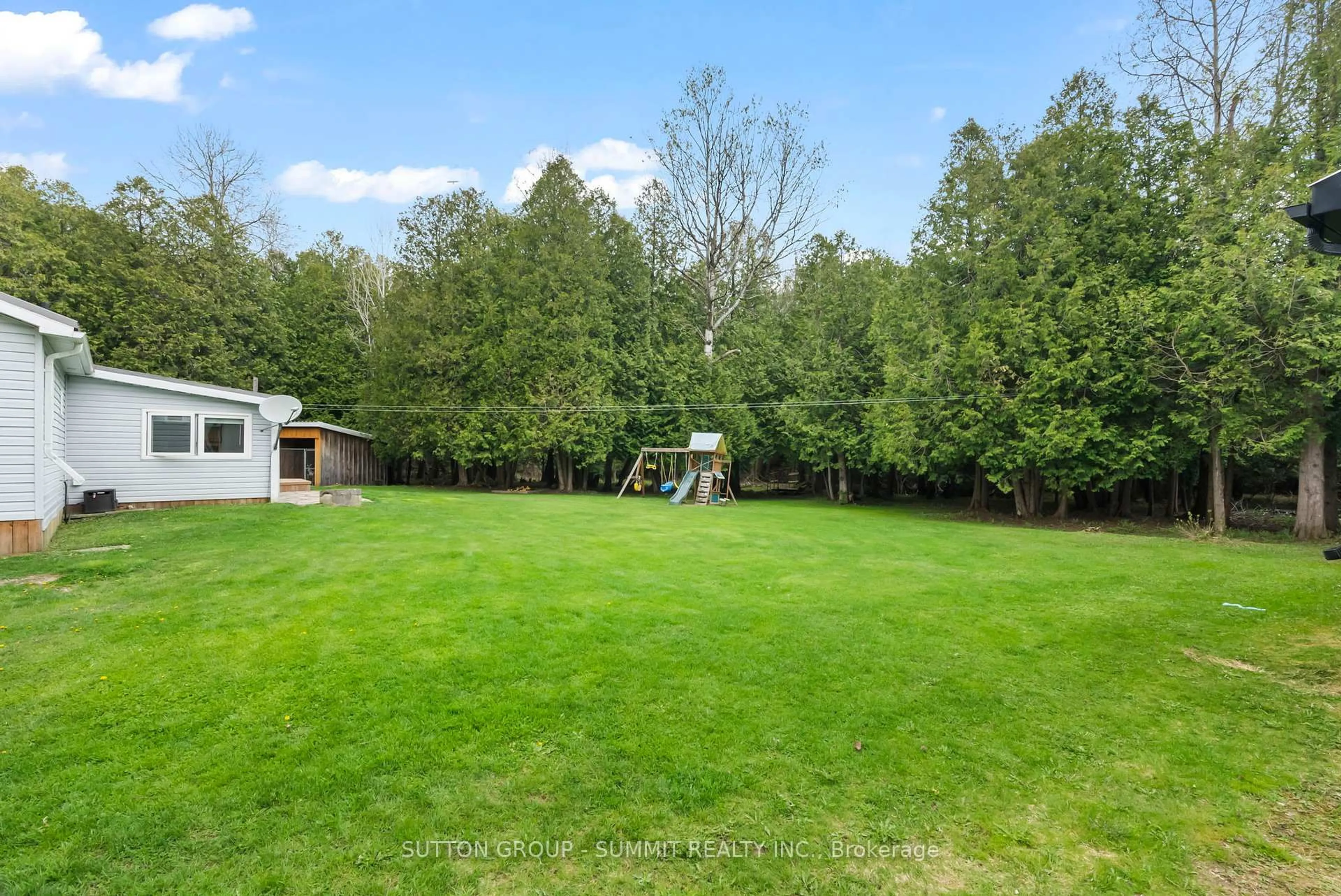 A pic from outside/outdoor area/front of a property/back of a property/a pic from drone, forest/trees view for 134 Paisley Dr, Chatsworth Ontario N0G 1L0