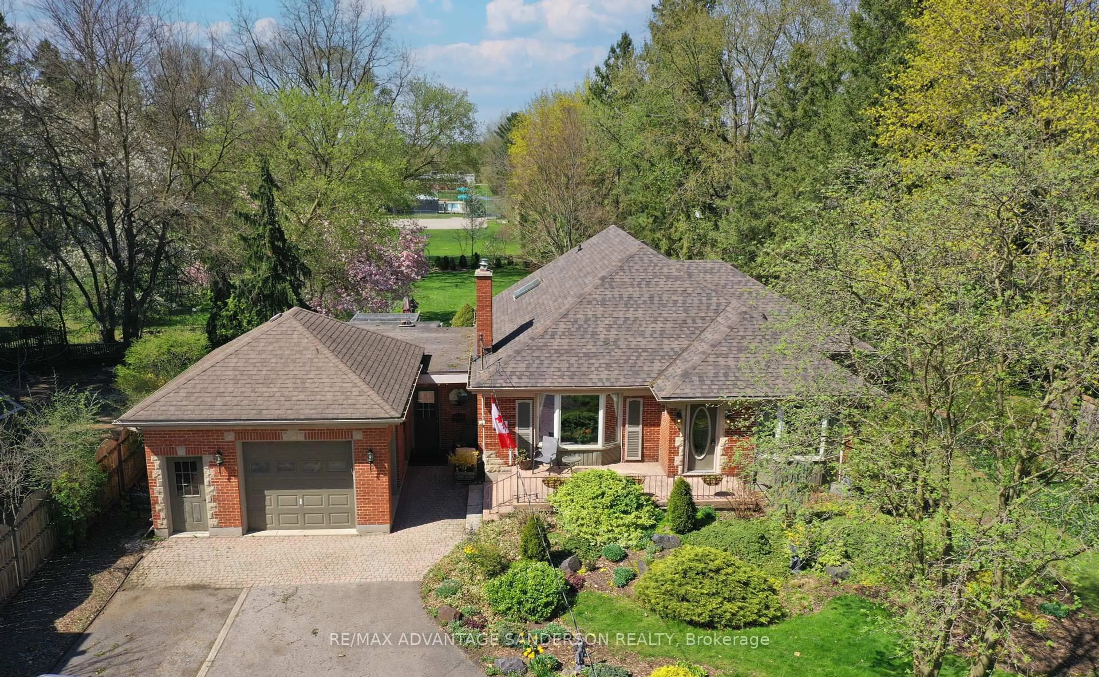 A pic from outside/outdoor area/front of a property/back of a property/a pic from drone, street for 1313 Byron Baseline Rd, London South Ontario N6K 2E4