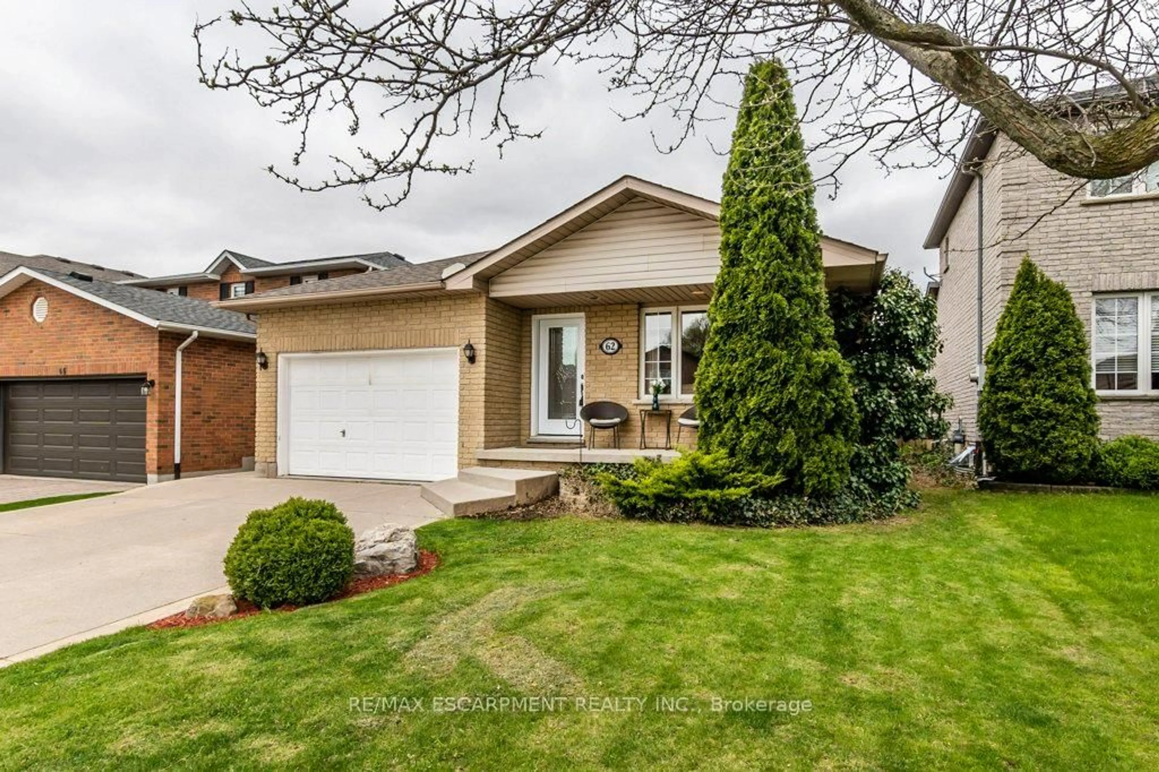 Home with vinyl exterior material, street for 62 Spadara Dr, Hamilton Ontario L9B 2K3