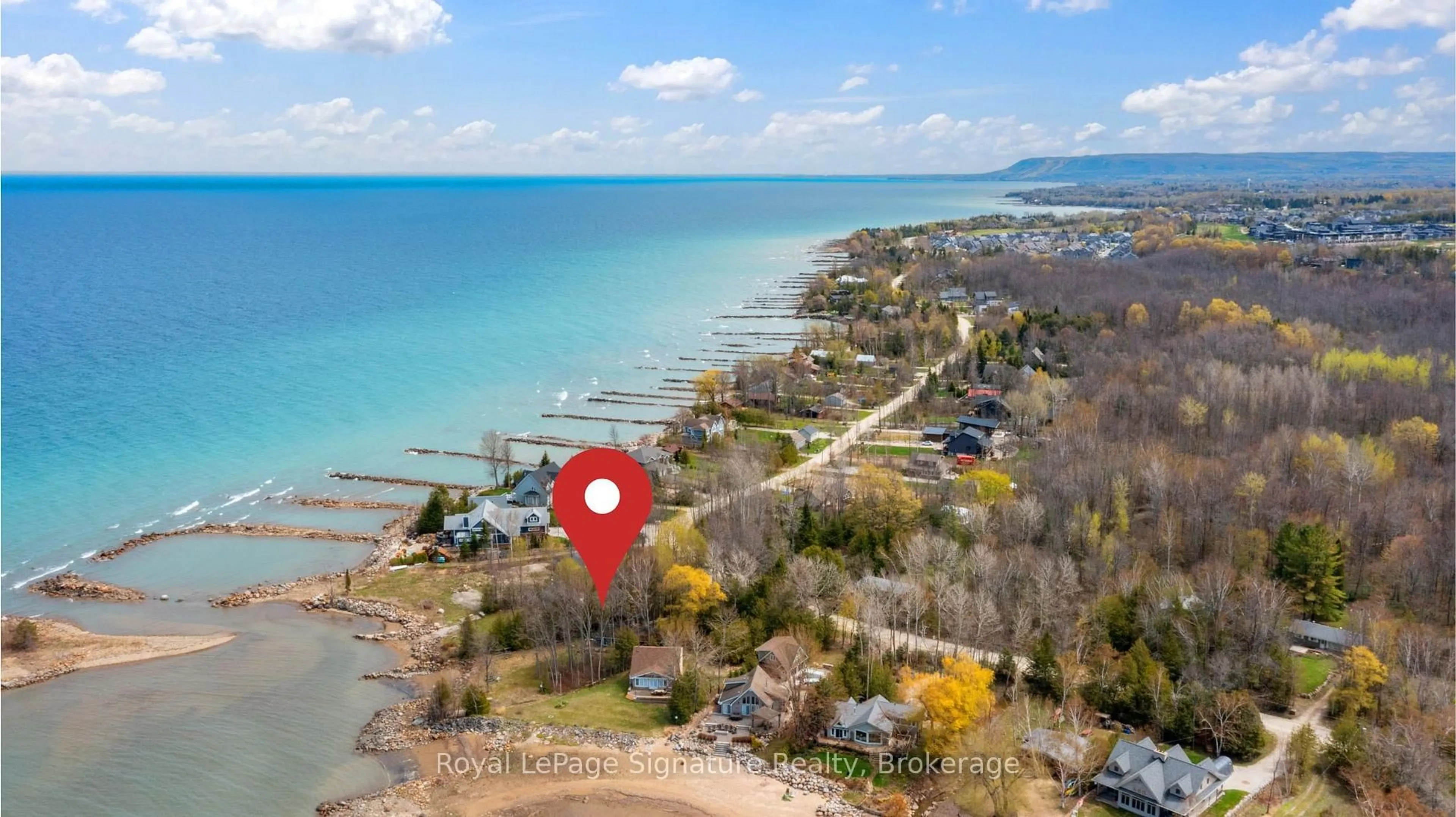 A pic from outside/outdoor area/front of a property/back of a property/a pic from drone, water/lake/river/ocean view for 129 Sunset Blvd, Blue Mountains Ontario N0H 2P0