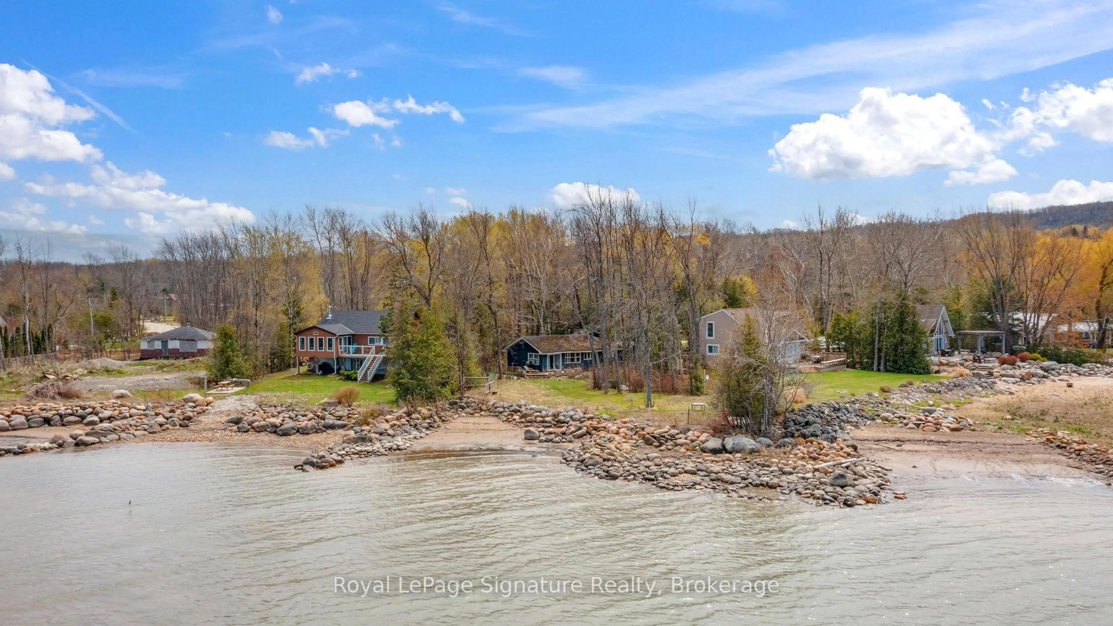 A pic from outside/outdoor area/front of a property/back of a property/a pic from drone, water/lake/river/ocean view for 129 Sunset Blvd, Blue Mountains Ontario N0H 2P0