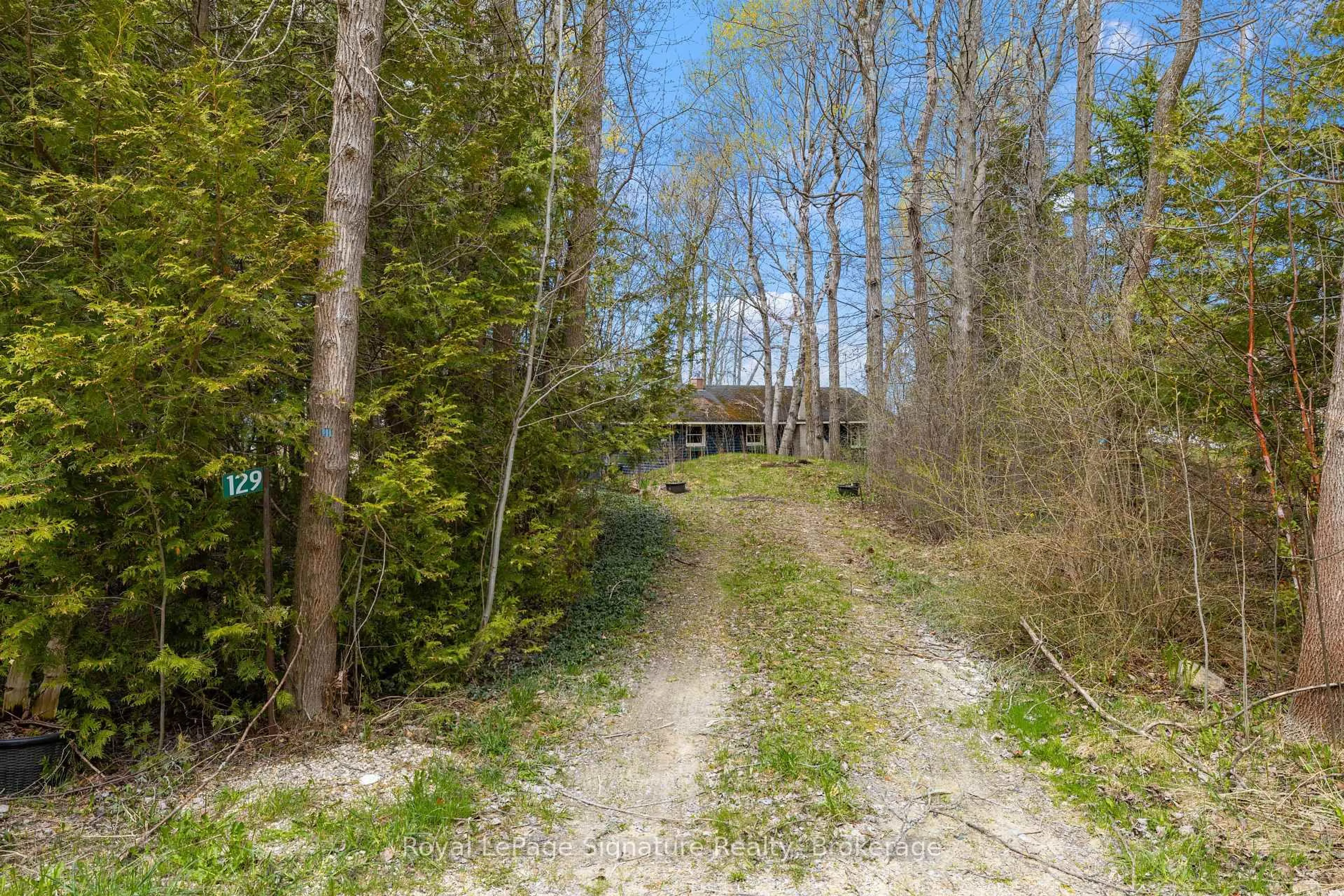 A pic from outside/outdoor area/front of a property/back of a property/a pic from drone, forest/trees view for 129 Sunset Blvd, Blue Mountains Ontario N0H 2P0