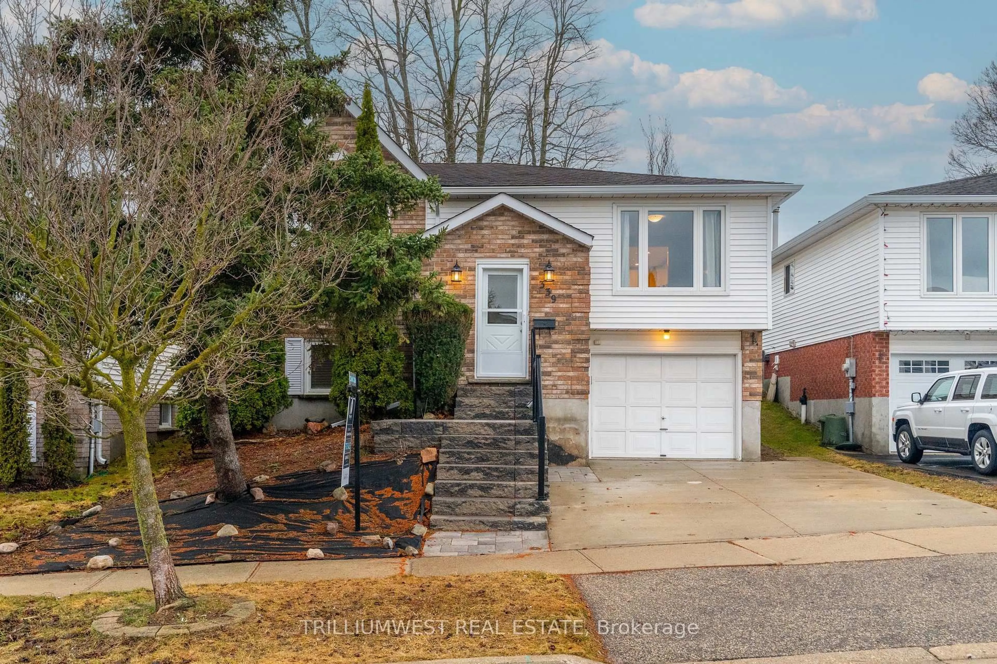 Home with vinyl exterior material, street for 339 Misty Cres, Kitchener Ontario N2B 3V5