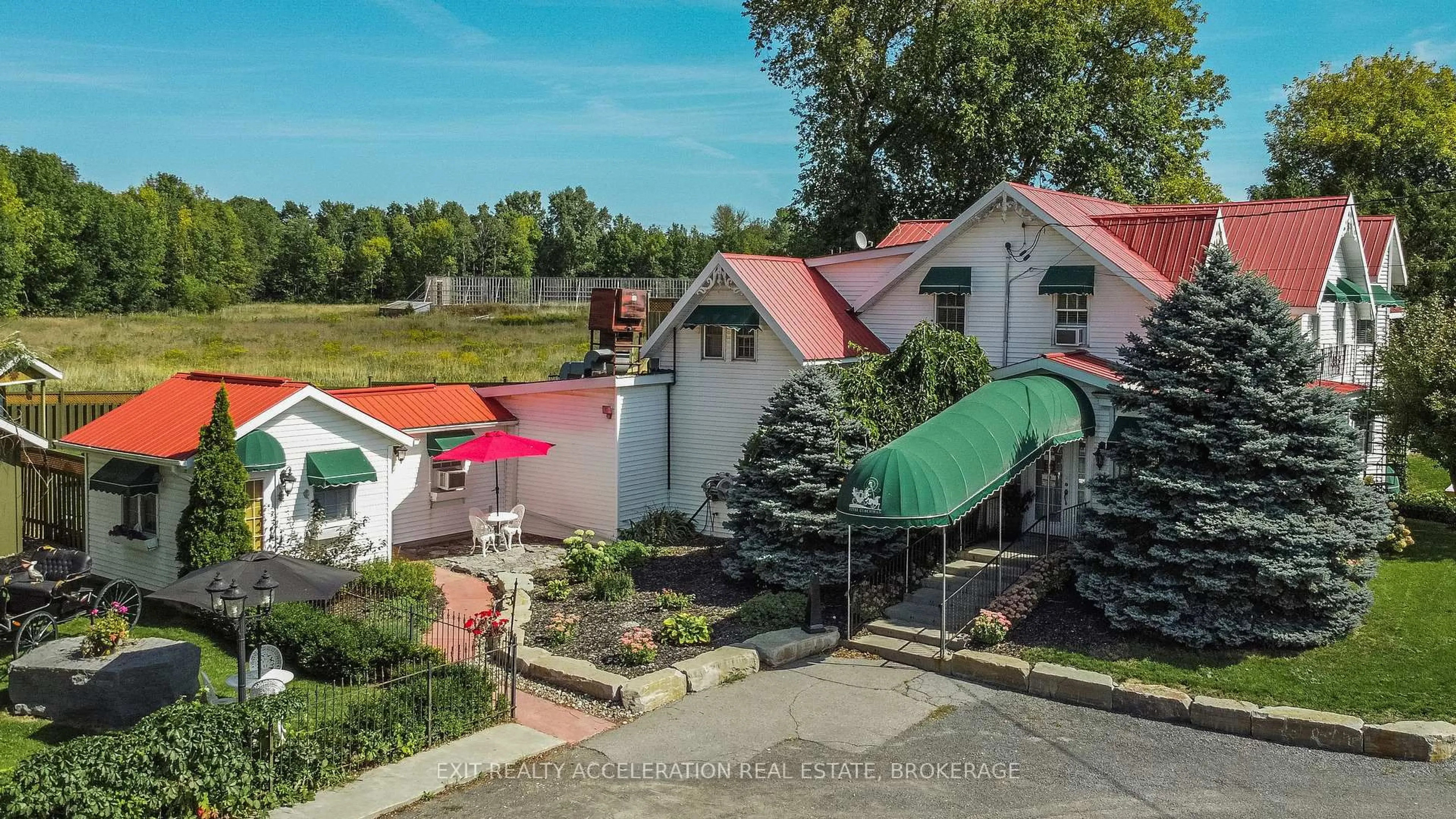 A pic from outside/outdoor area/front of a property/back of a property/a pic from drone, unknown for 8087 County Road 2, Napanee Ontario K7R 3K6