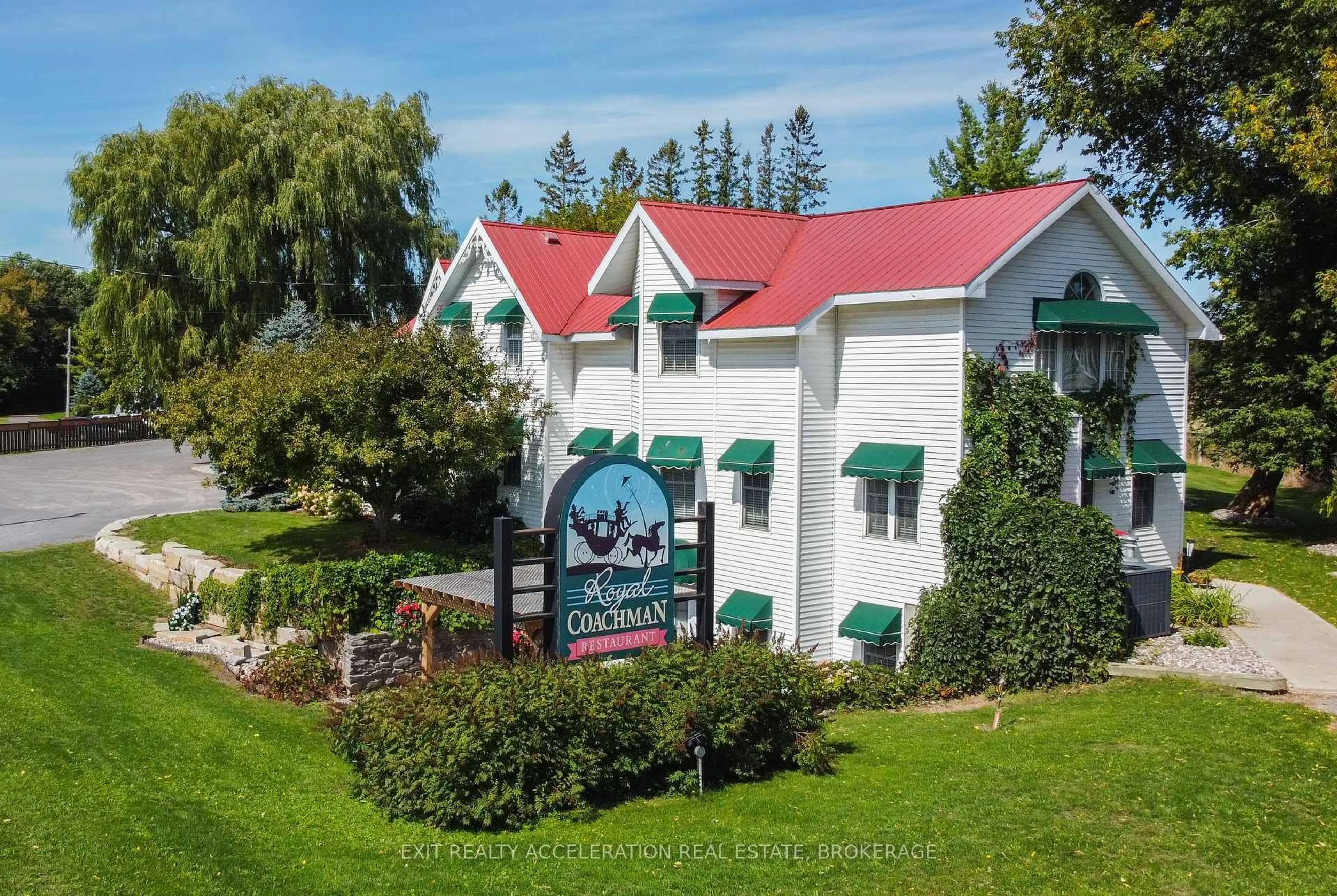 A pic from outside/outdoor area/front of a property/back of a property/a pic from drone, unknown for 8087 County Road 2, Napanee Ontario K7R 3K6