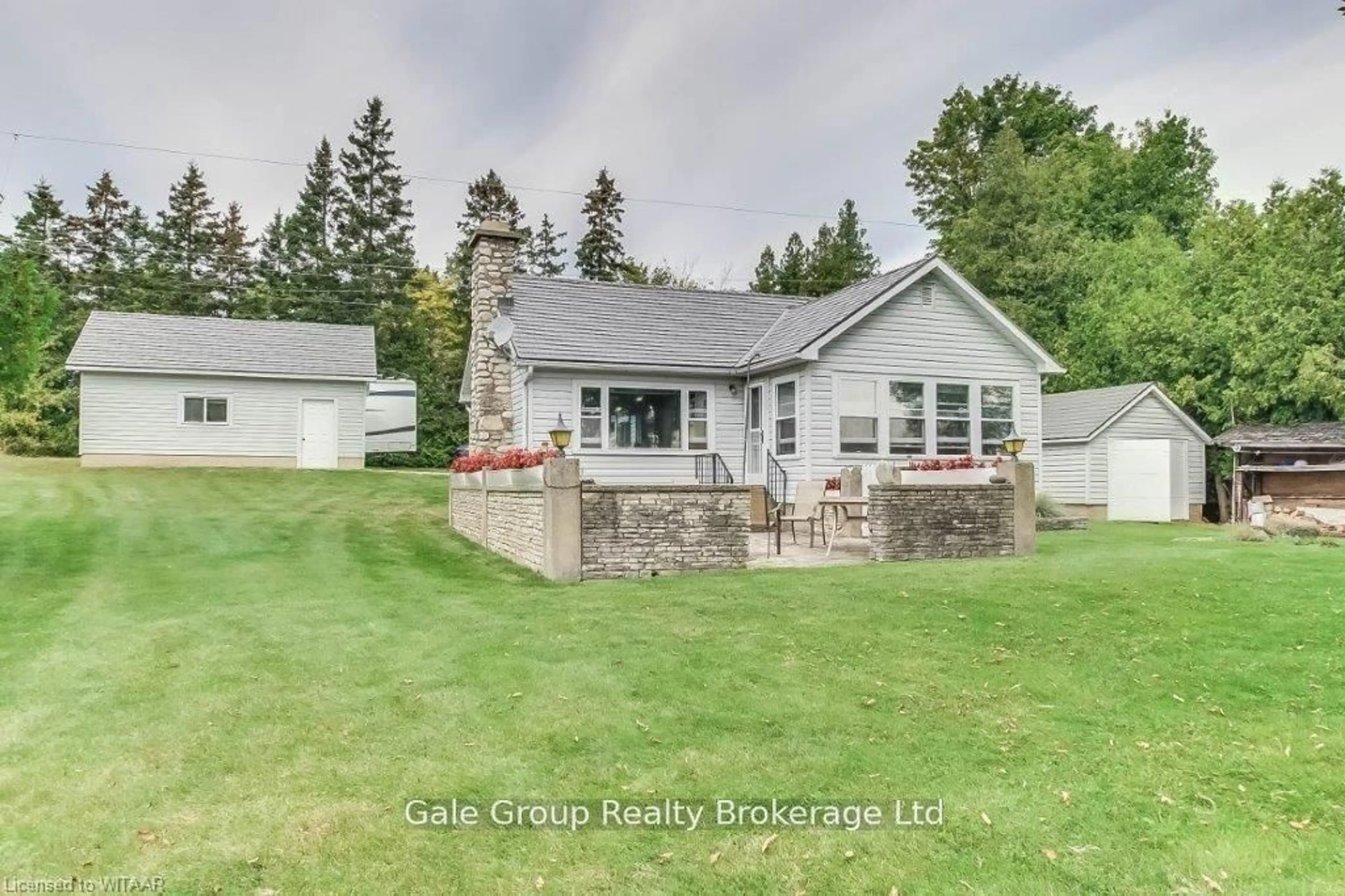 A pic from outside/outdoor area/front of a property/back of a property/a pic from drone, unknown for 117 TAMARAC Rd, Northern Bruce Peninsula Ontario N0H 2M0