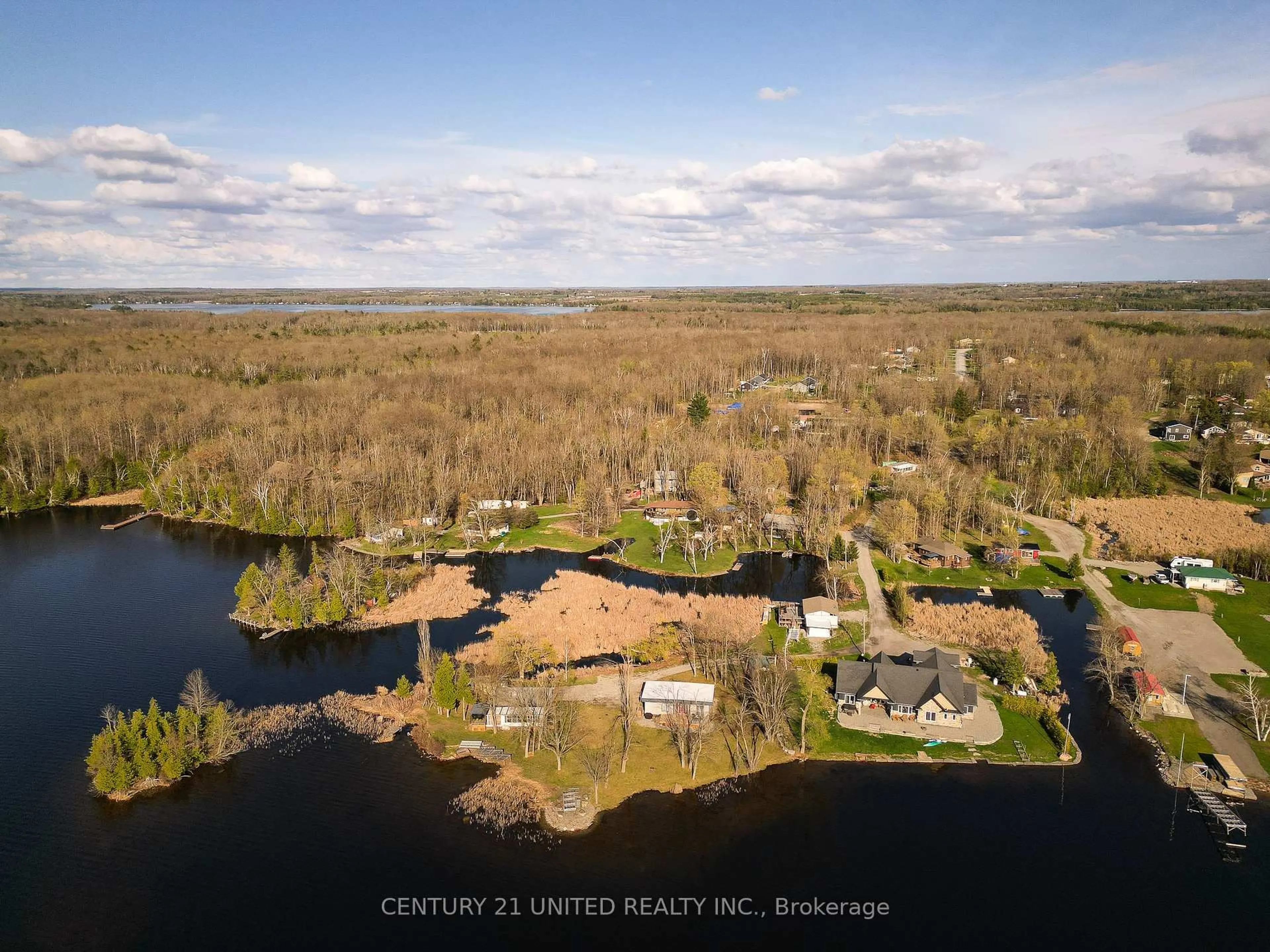 A pic from outside/outdoor area/front of a property/back of a property/a pic from drone, water/lake/river/ocean view for 115 Rollie's Bay Rd, Curve Lake First Nation 35 Ontario K0L 2H0