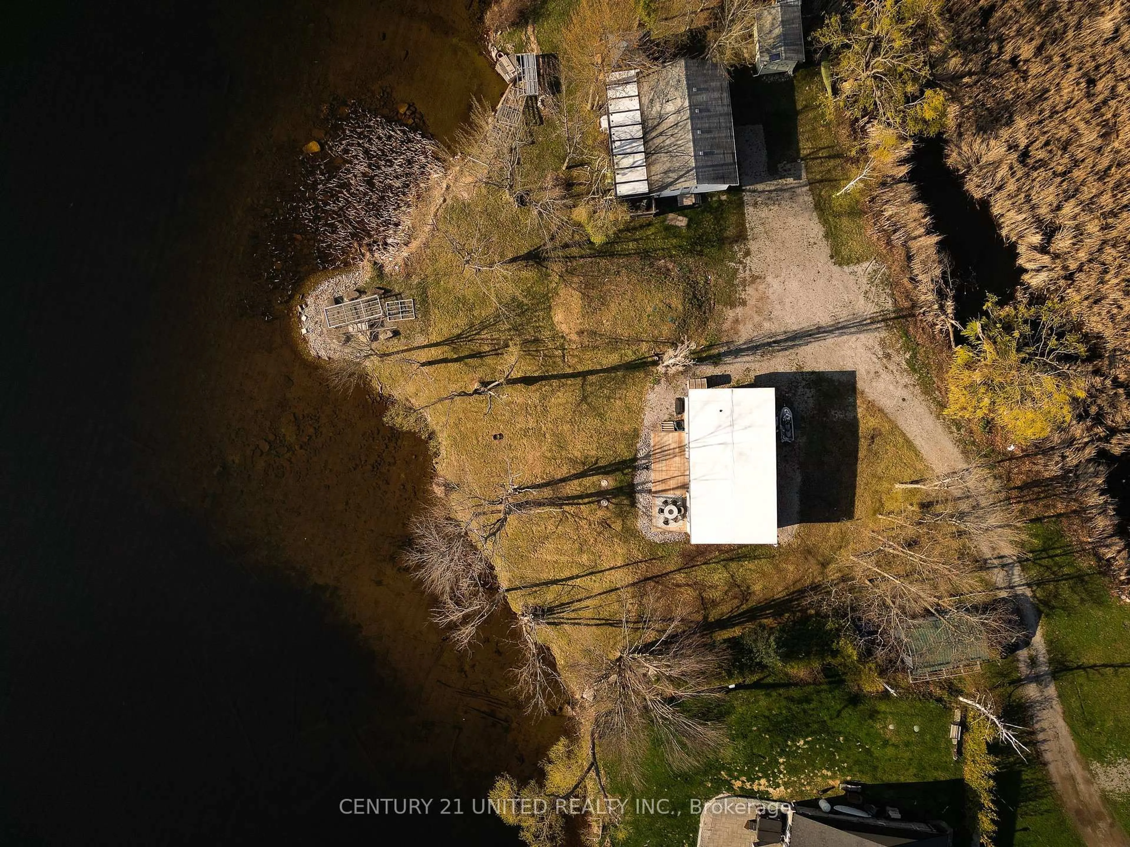 A pic from outside/outdoor area/front of a property/back of a property/a pic from drone, water/lake/river/ocean view for 115 Rollie's Bay Rd, Curve Lake First Nation 35 Ontario K0L 2H0