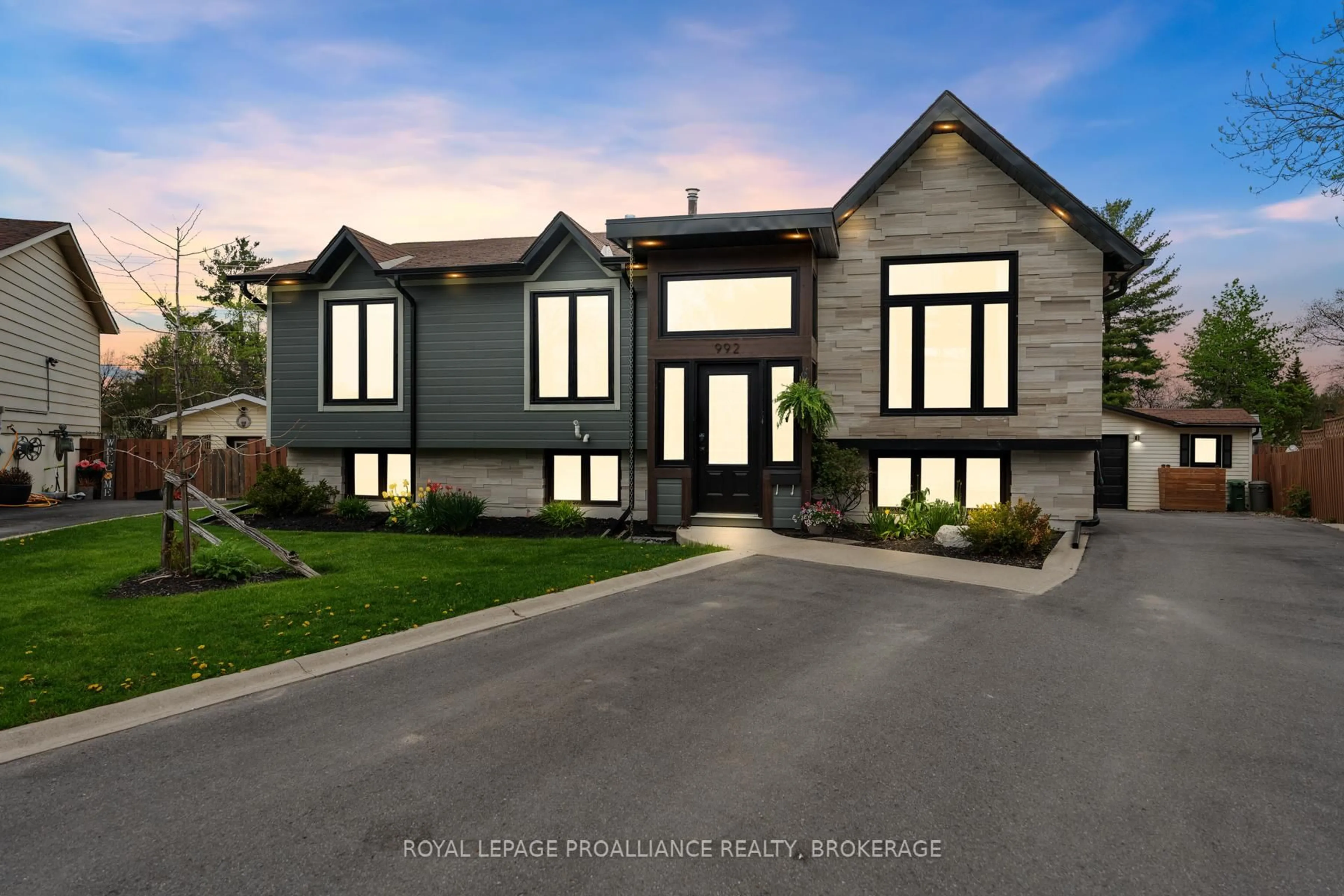 Home with brick exterior material, street for 992 Winford Pl, Kingston Ontario K7P 1J8