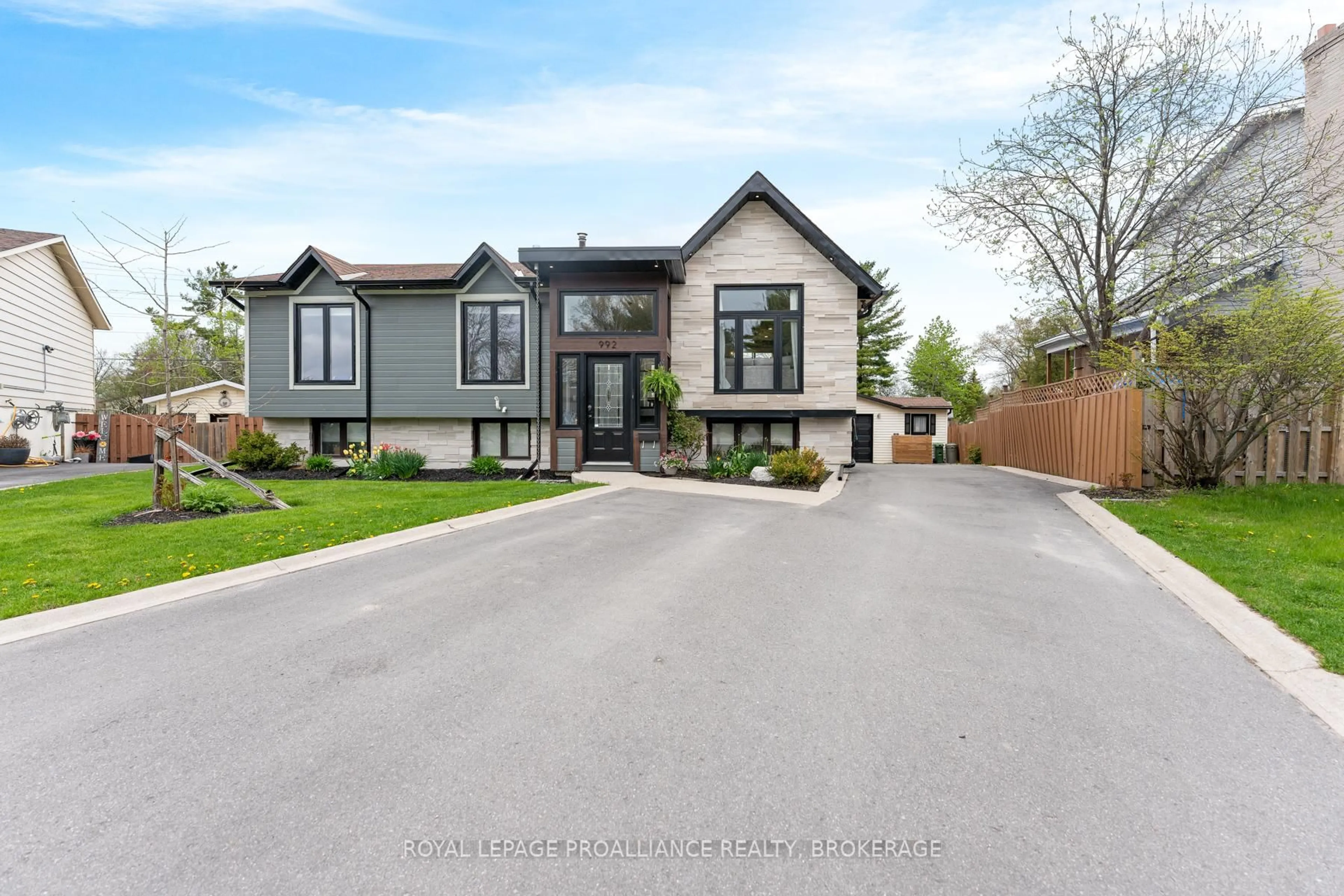 Home with brick exterior material, street for 992 Winford Pl, Kingston Ontario K7P 1J8